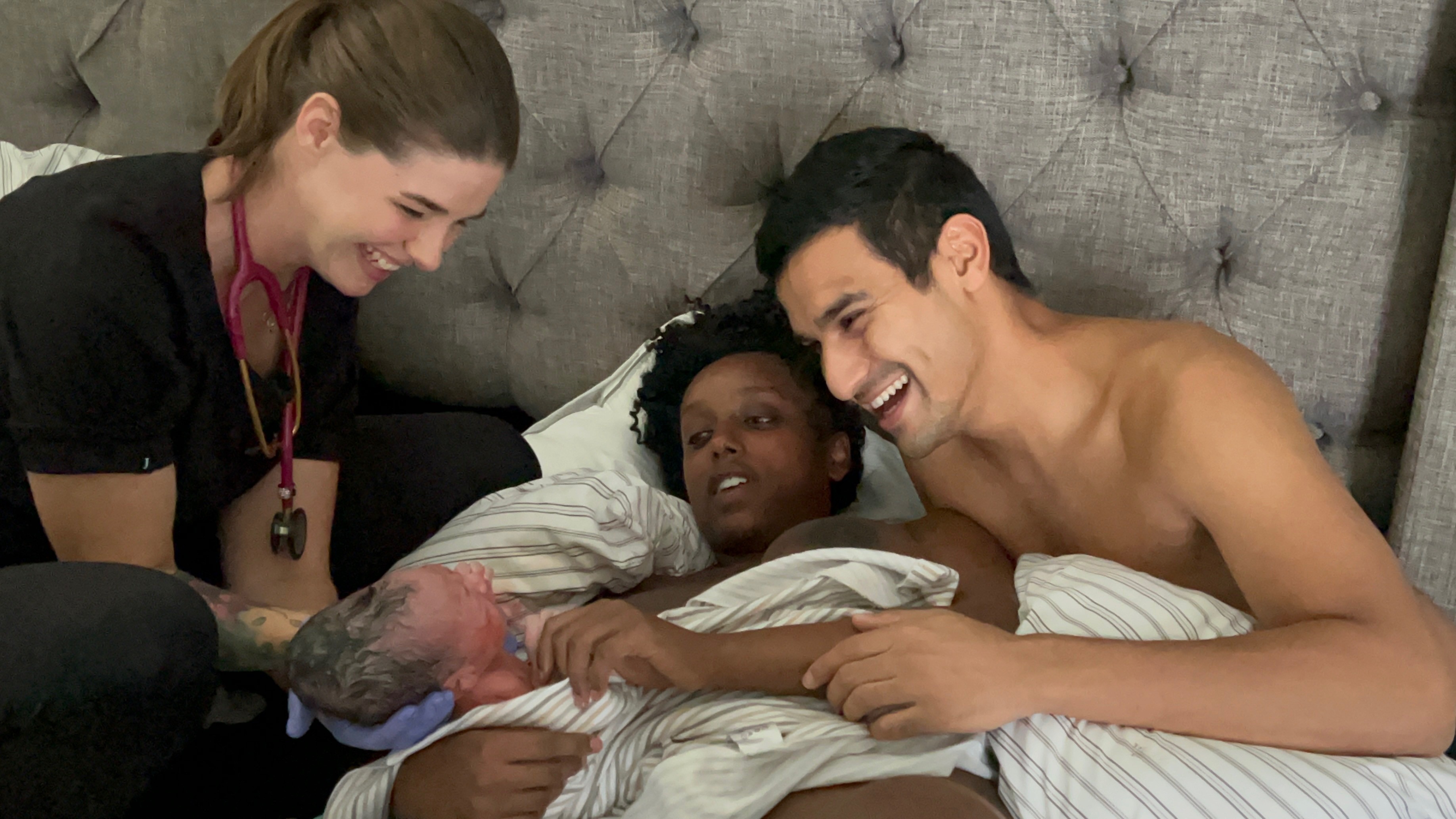 Midwife Kaitlin introducing baby to their parents