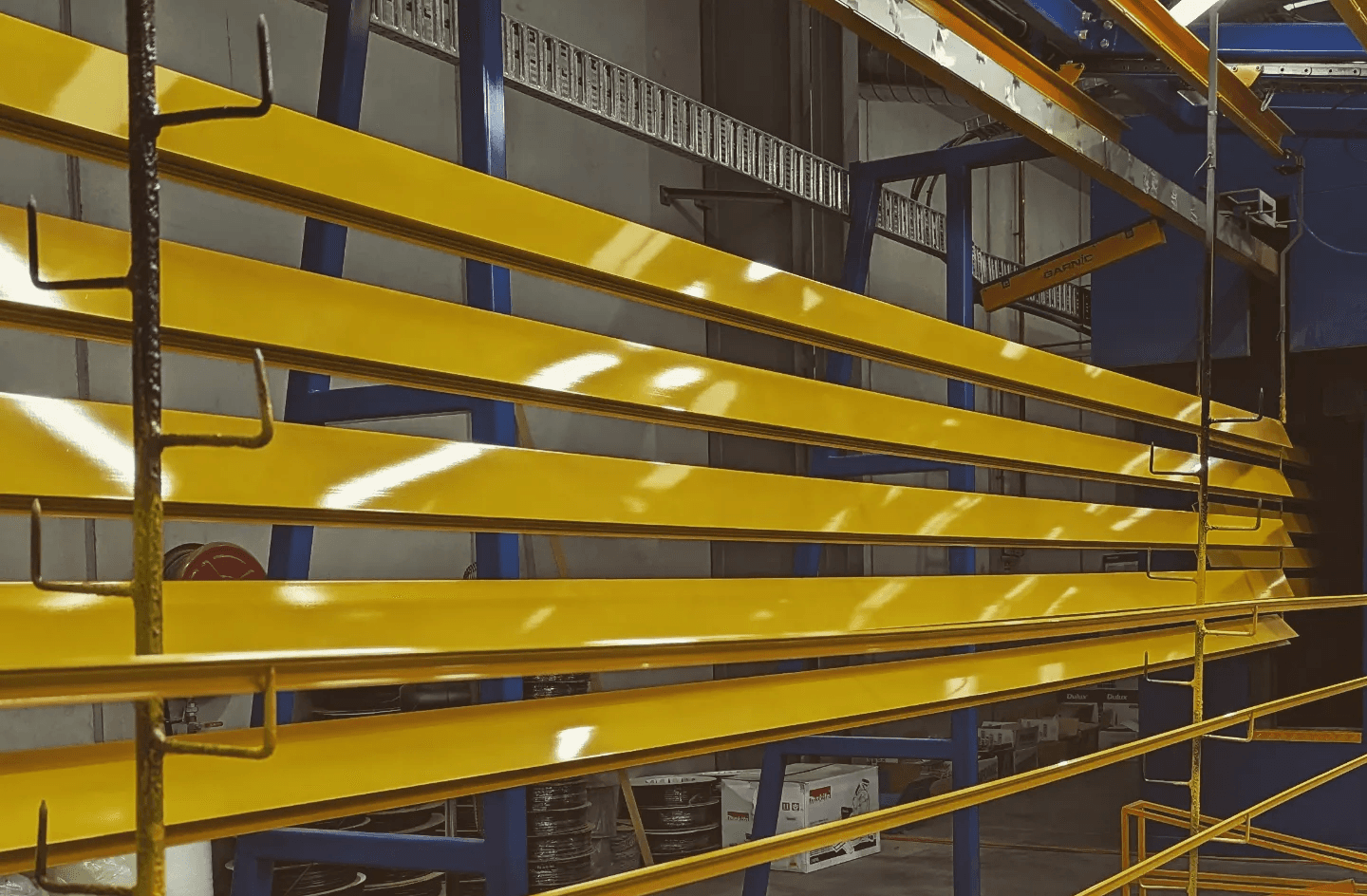 solar panel and windmill produce by press metal standing tall on grass with clean background