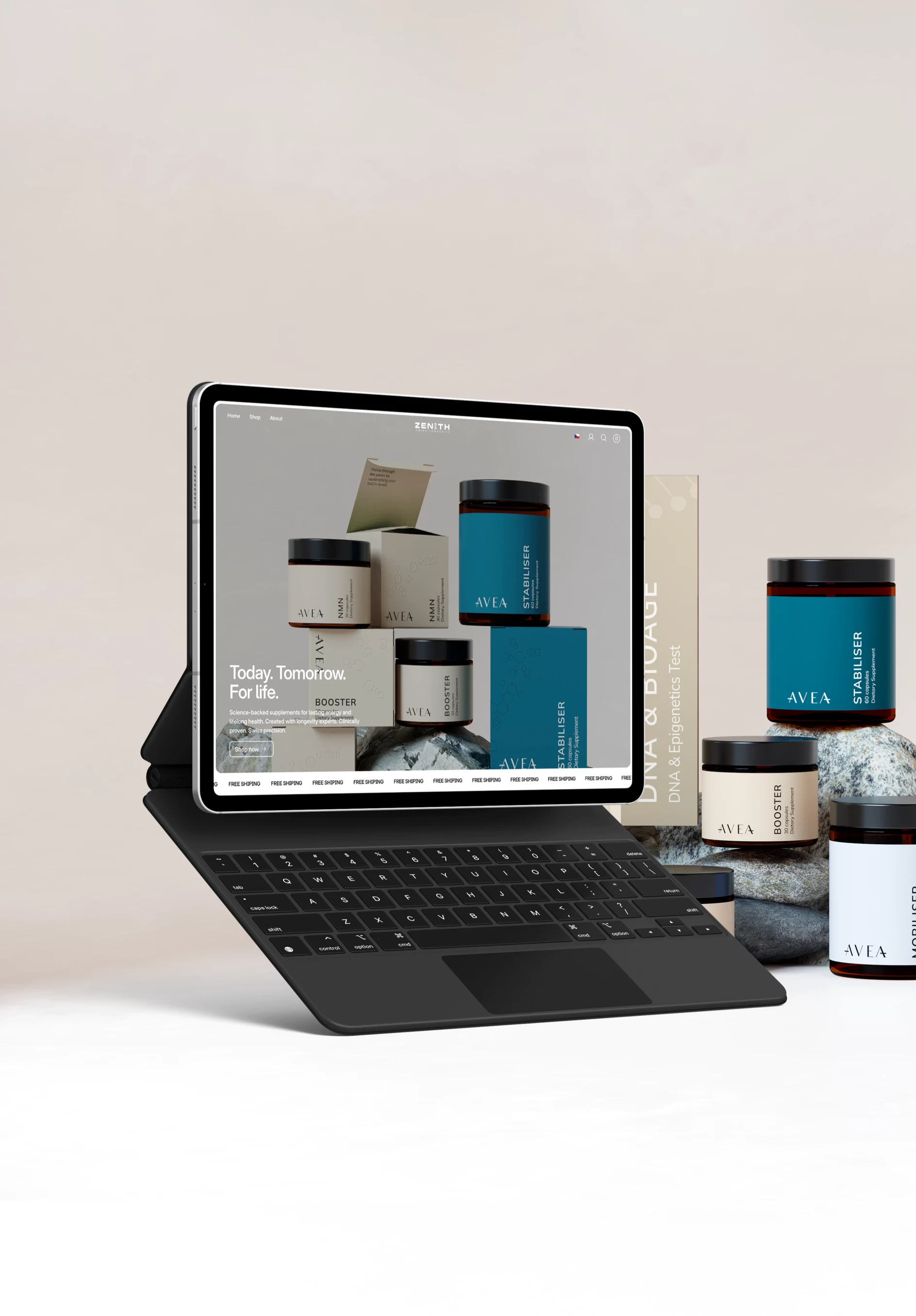 Close-up portrait of a person wearing a gray insulated hooded jacket with the hood up, showing their face framed by the hood against a light background.