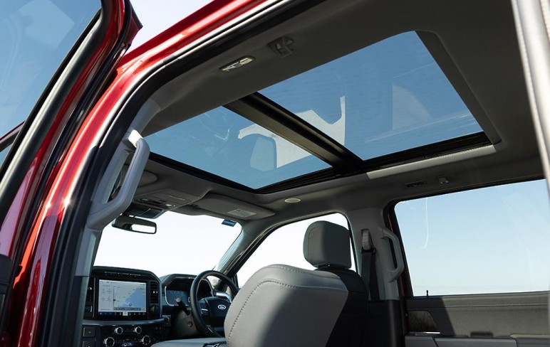 a close up of a steering wheel and dashboard of a car