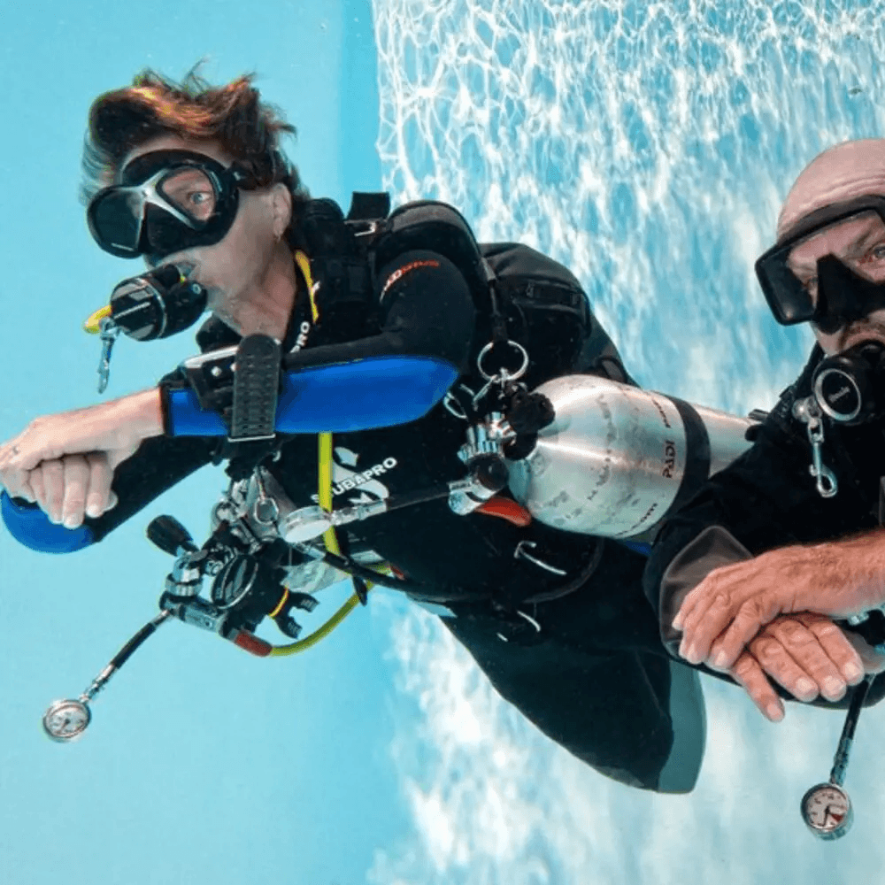 Man performing safety self-reliant diving technique