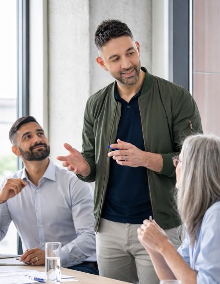 Business Coach talking to business owners
