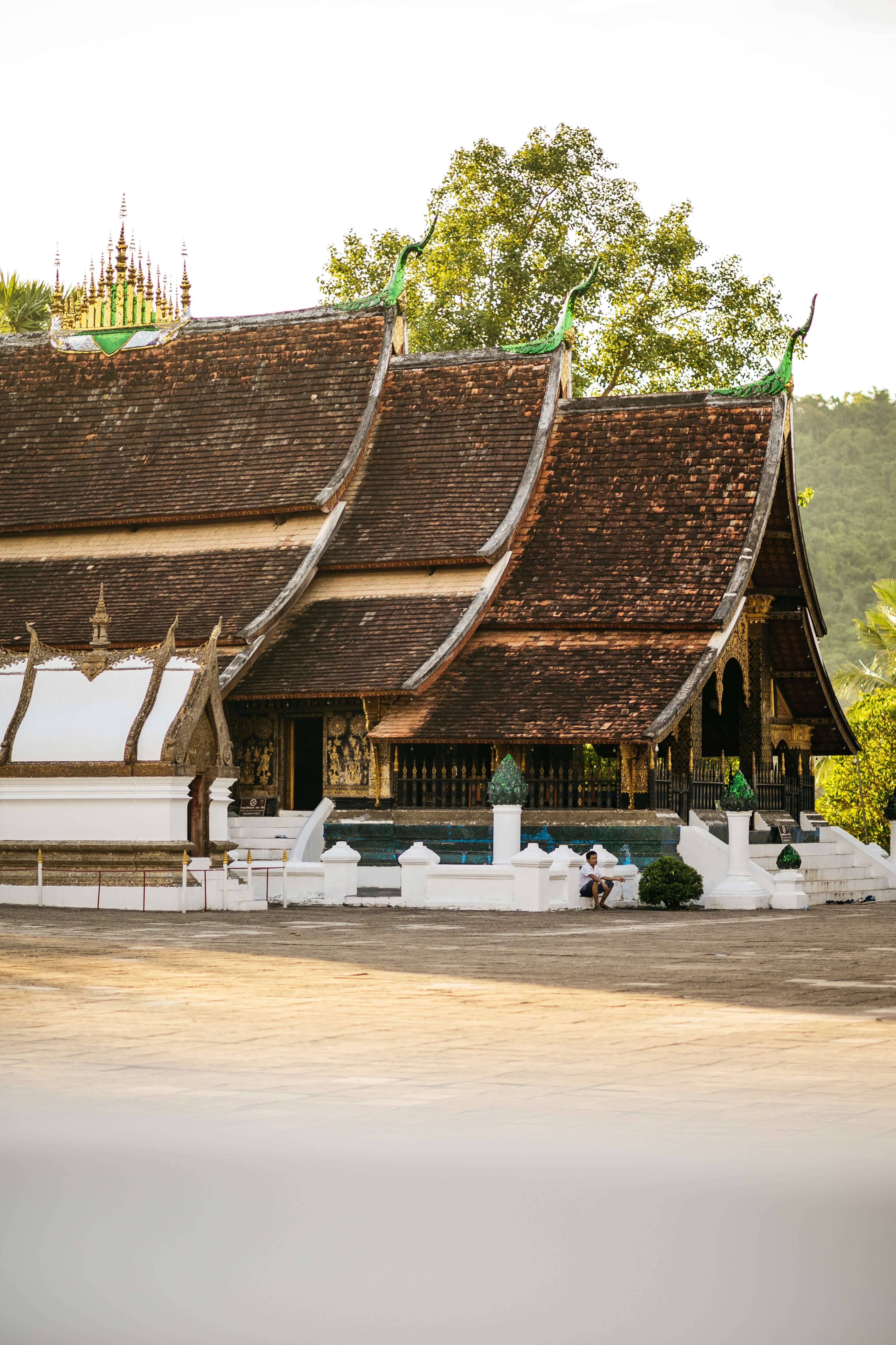 Asian building in a well vegetated area
