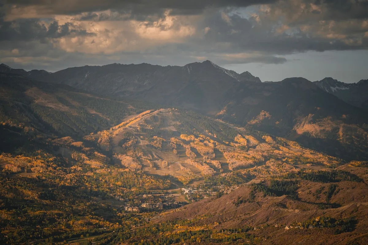 Light fading over the Snowmass Village ski slopes at dusk