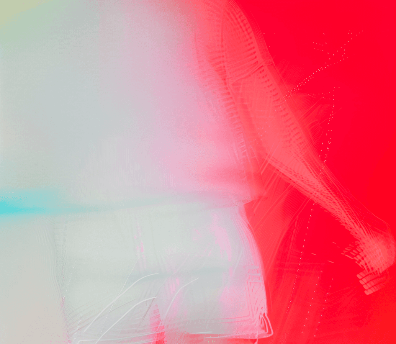 A blurry image of a person walking, suggesting movement and activity in an outdoor setting.