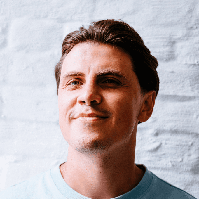 A portrait of a young man smiling