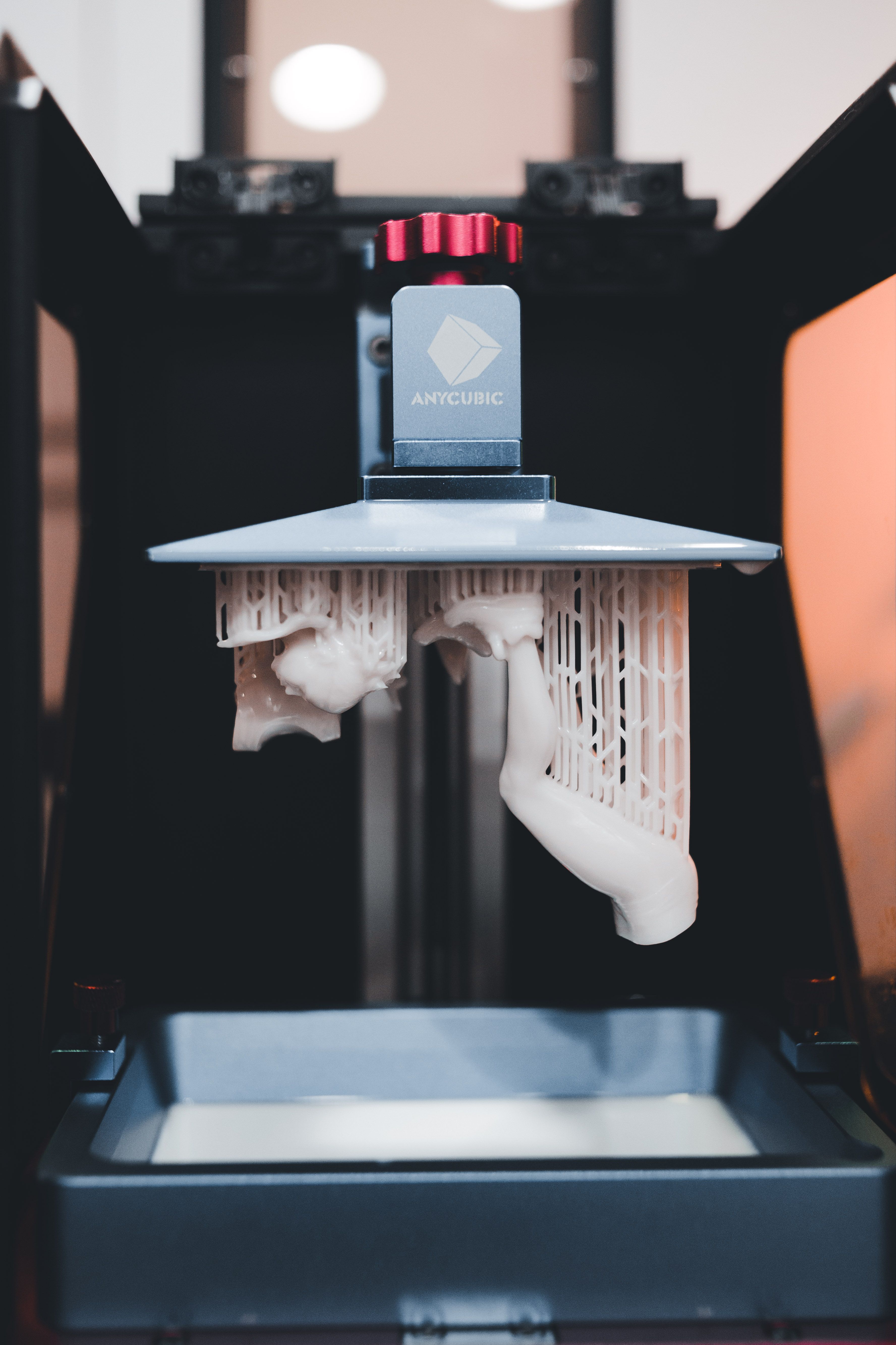 high-quality-close-up-of-a-3d-printer-printing-an-object-with-resin. - erik-mclean (pexels)