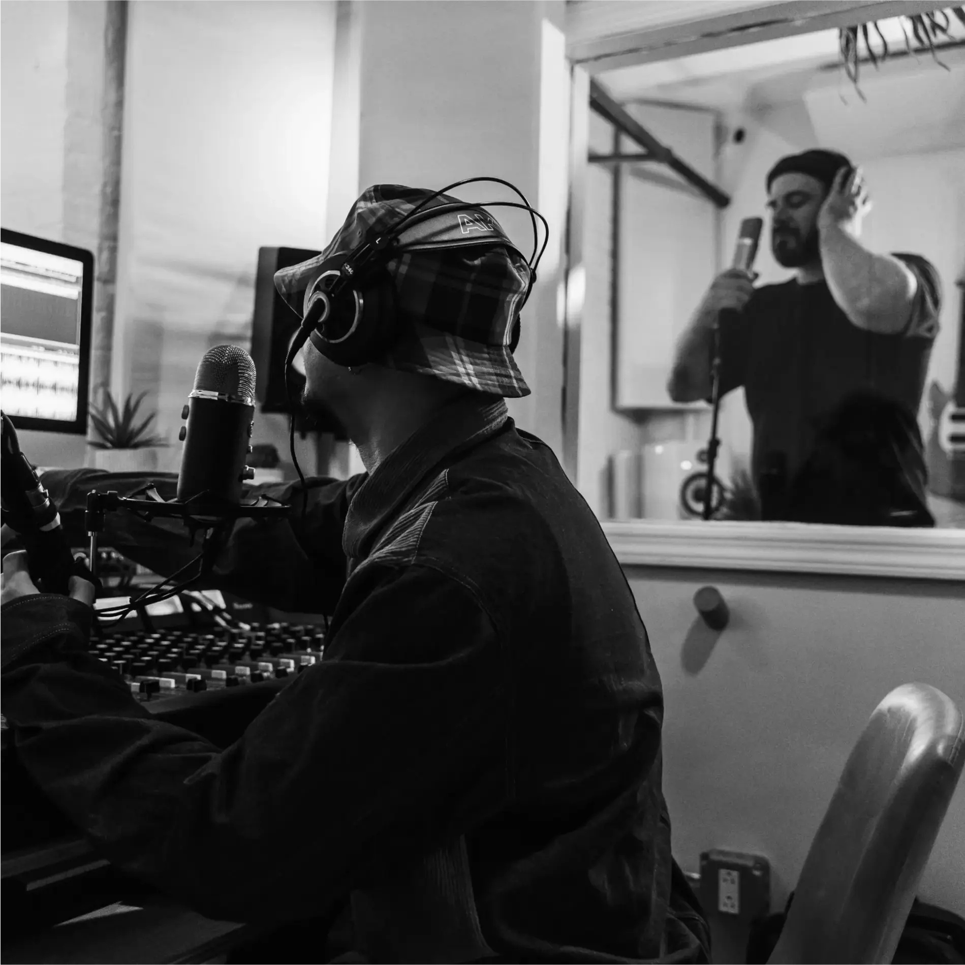 The musicians networking in a recording studio.