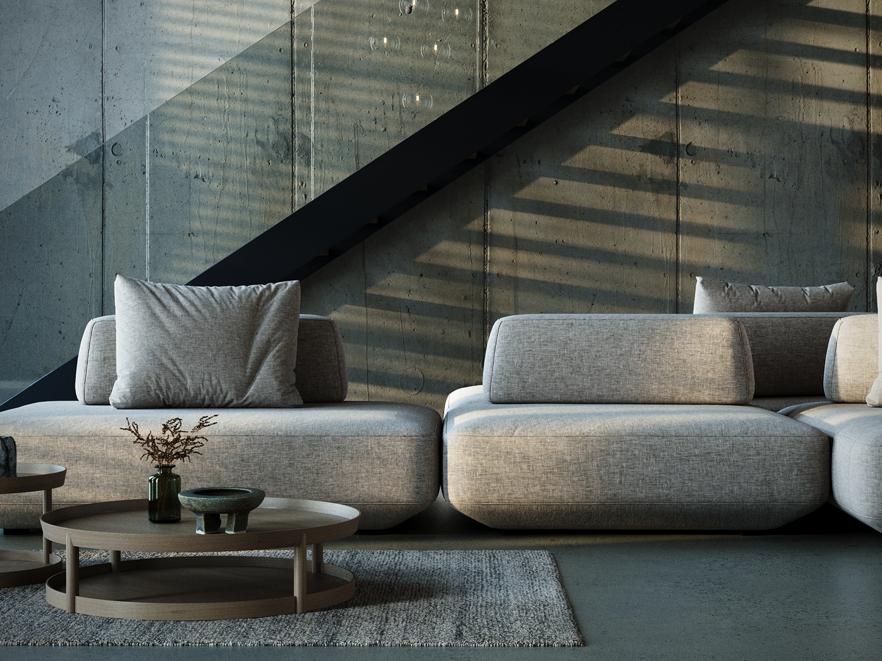 Salon — rangements bas intégrés et tapis à tissage plat.