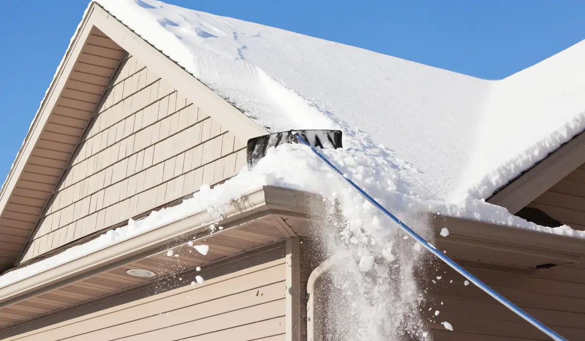 Gutter problems like ice buildup and overflow threaten rain gutter homes during heavy winter storms