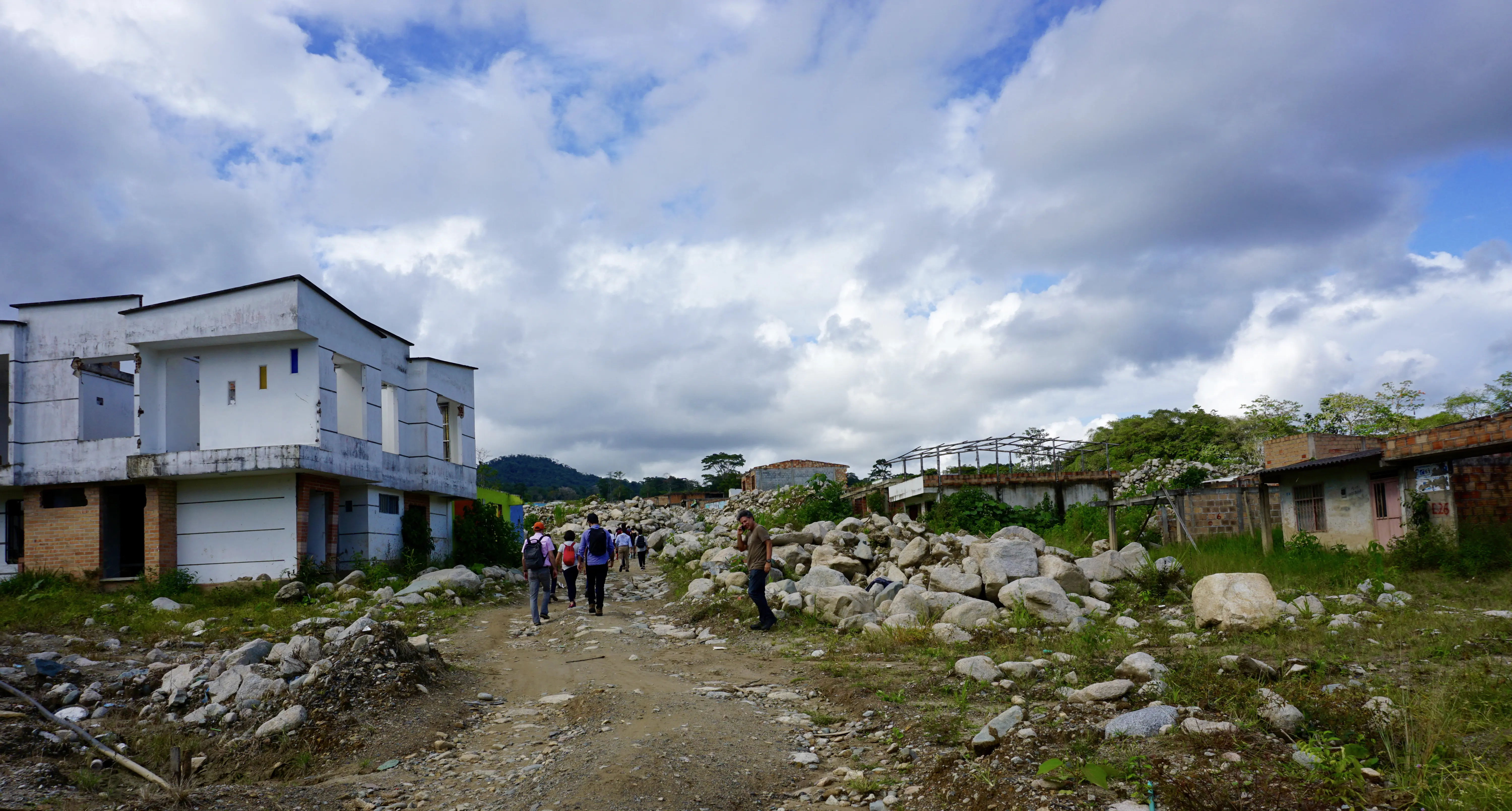 white and black drone on green grass during daytime