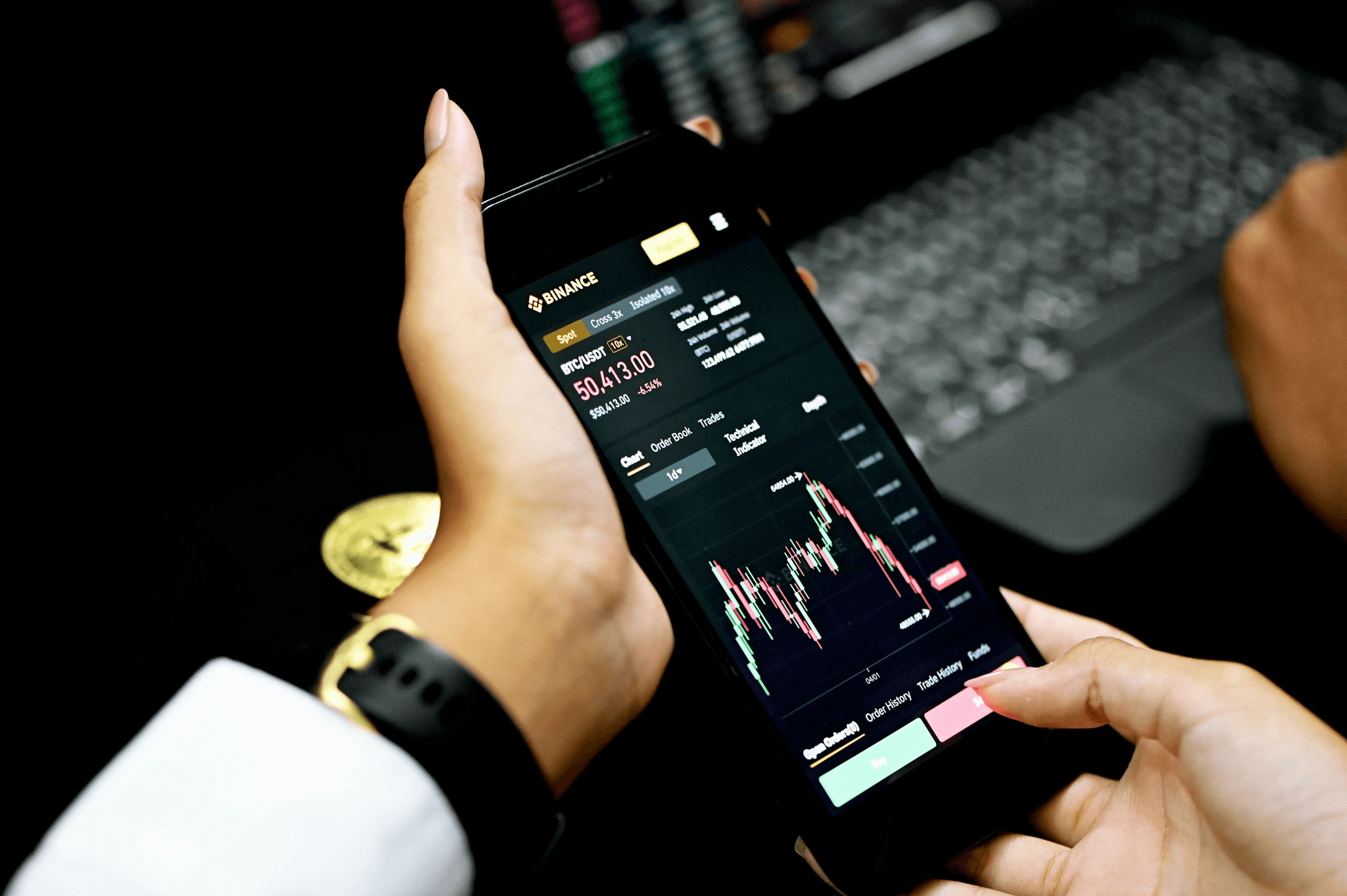 Woman trading cryptocurrency on a mobile app - BullX Alternative