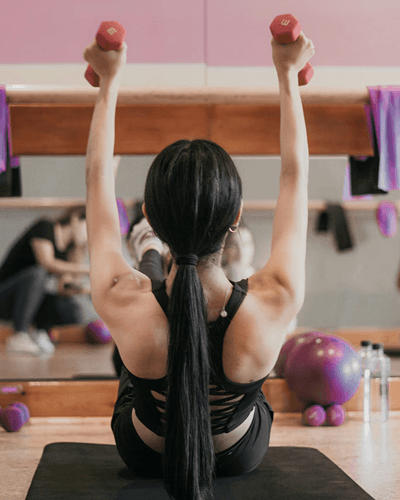 woman running wearing armband