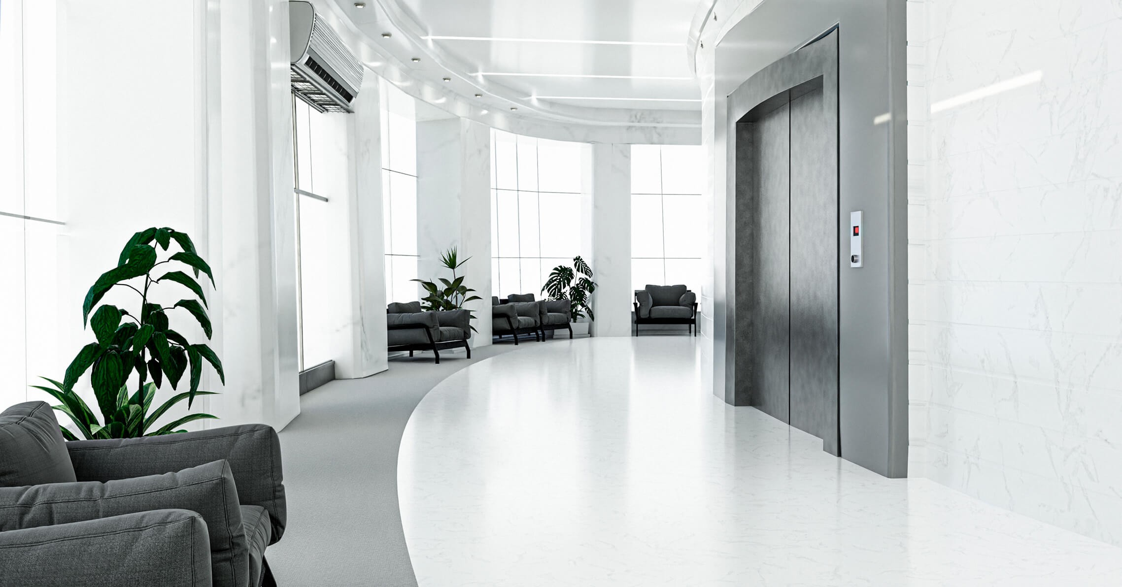 Modern clinic lobby with bright white interior, a sofa, and indoor plants