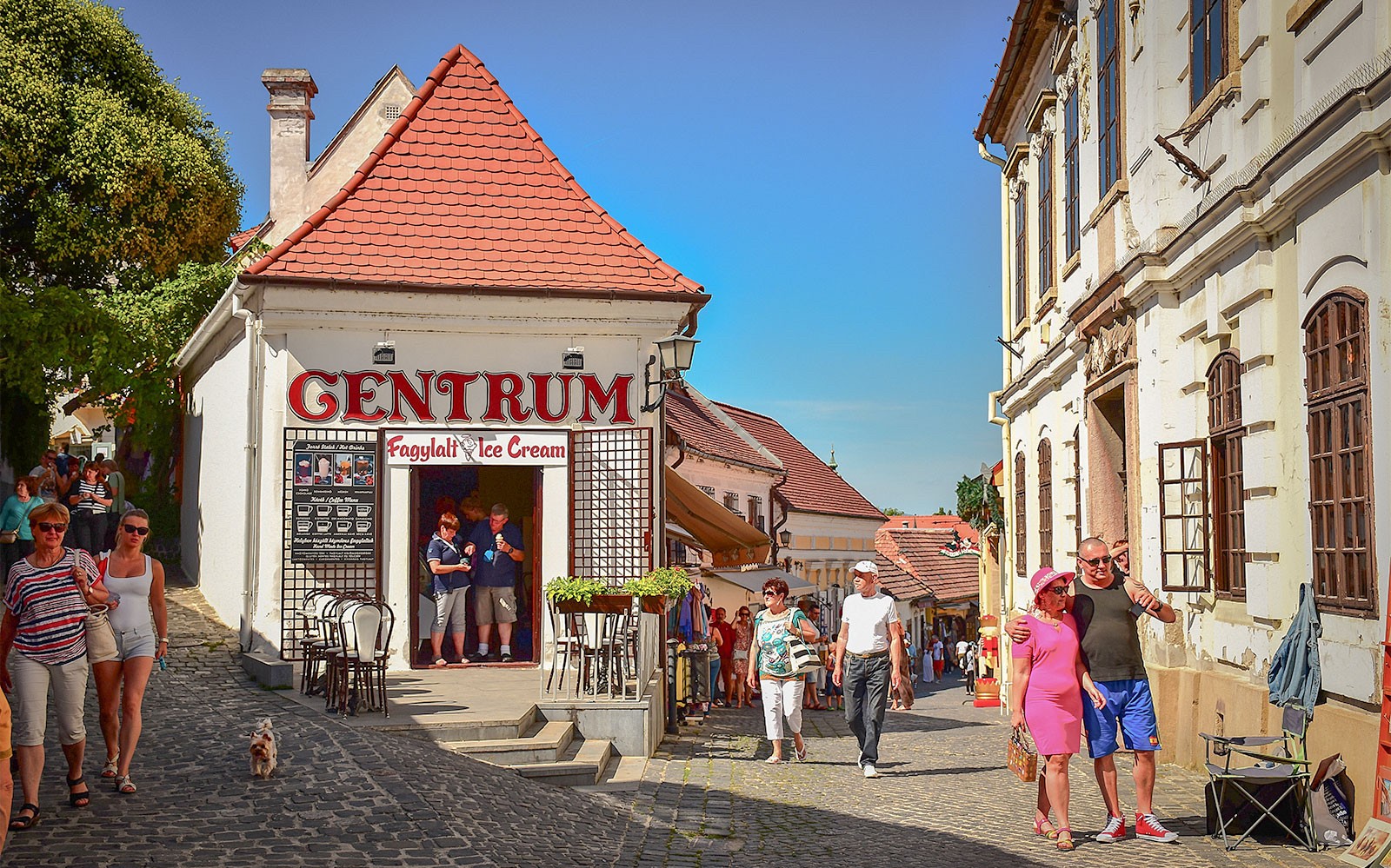 Szentendre street scene with tourists near an ice cream shop on a half-day tour from Budapest.
