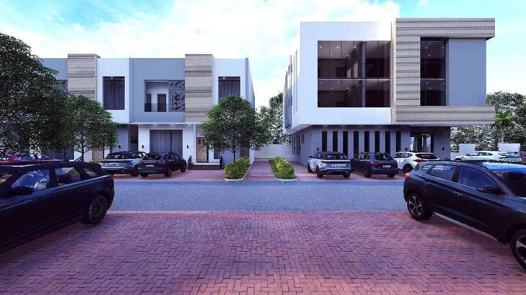 Modern white three-story building with lush greenery on balconies, set against a clear sky. A sleek black car drives by on a tree-lined street.