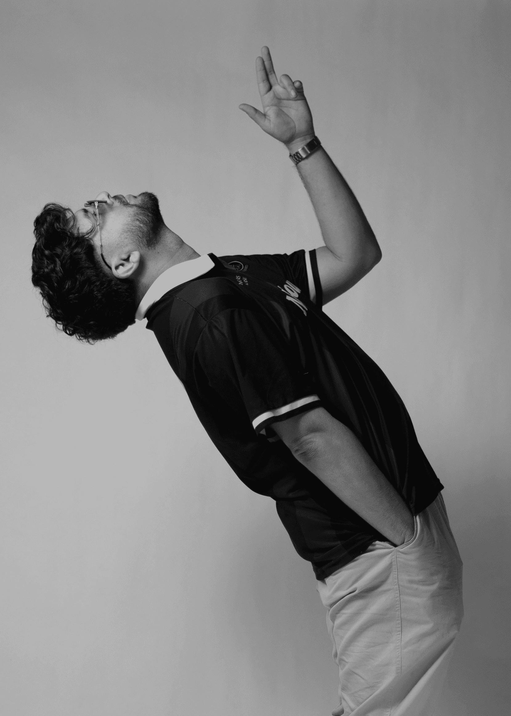 a blurry photo of a person standing in front of a wall