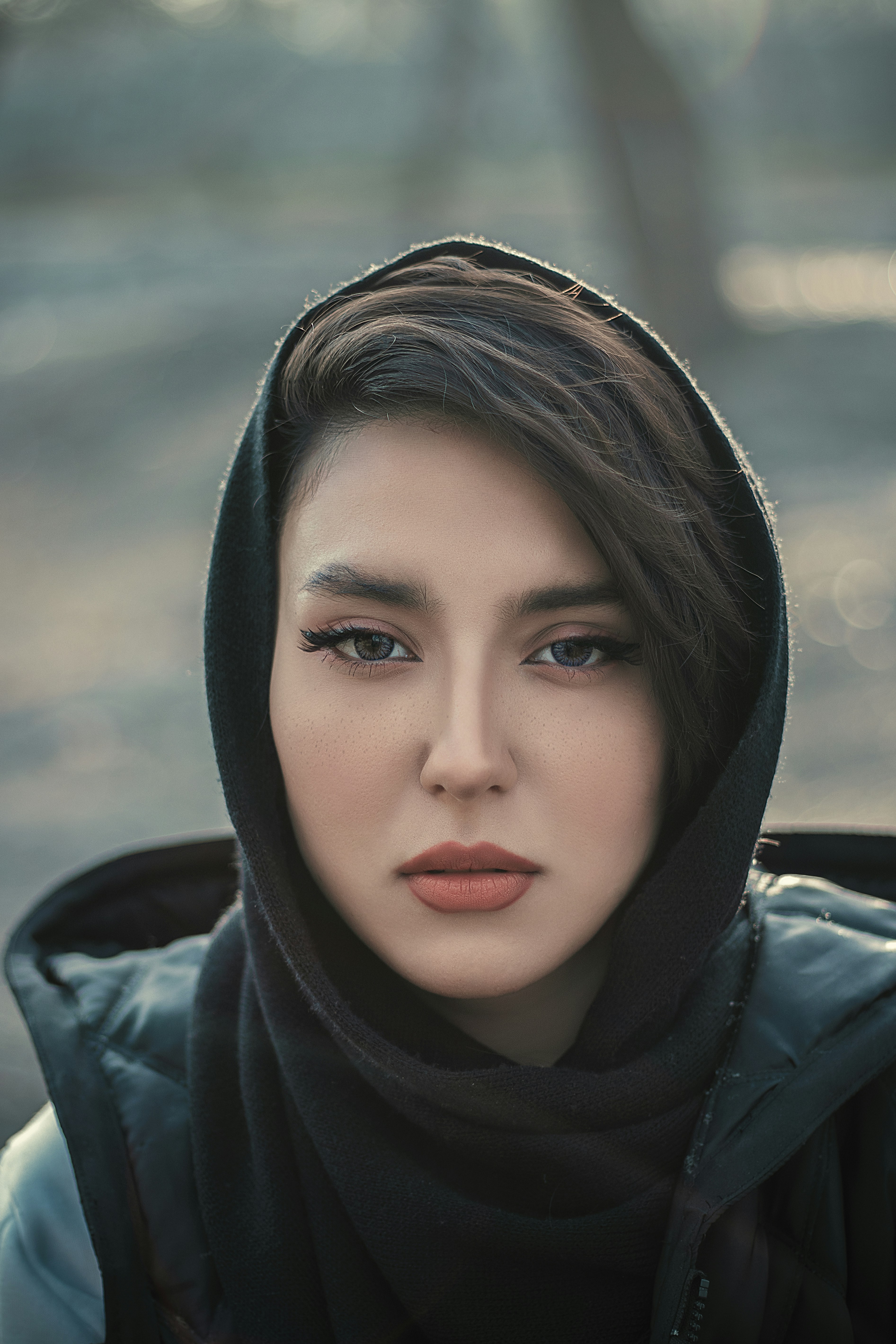 a woman with a scarf on her head