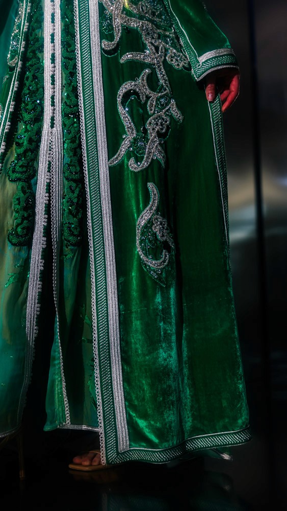 Emerald Moroccan caftan with silver hand embroidery, luxury handcrafted design prepared in Bahrain and finished by Moroccan artisans