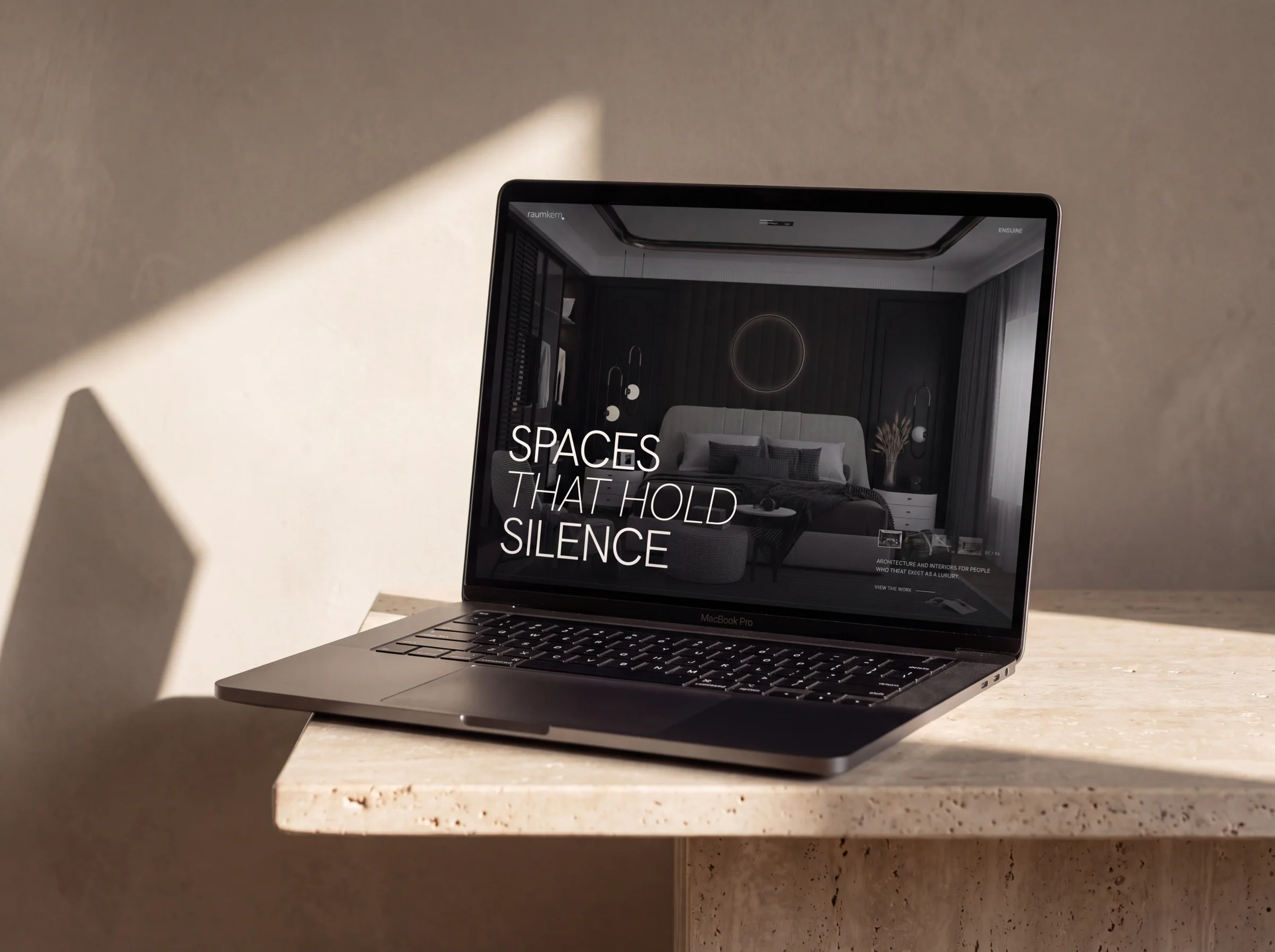 Raumkern — homepage hero, ‘Spaces that hold silence’, over a dark bedroom interior.