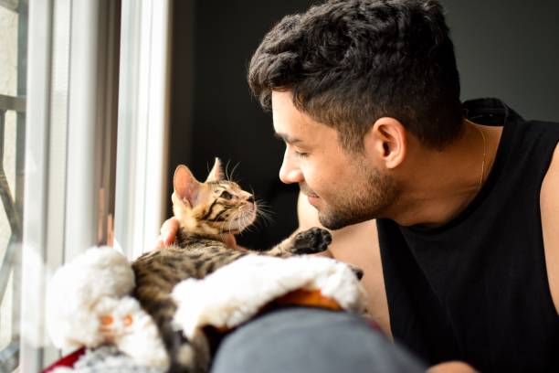 A pet owner happily plays with her owner after coming back from an errand