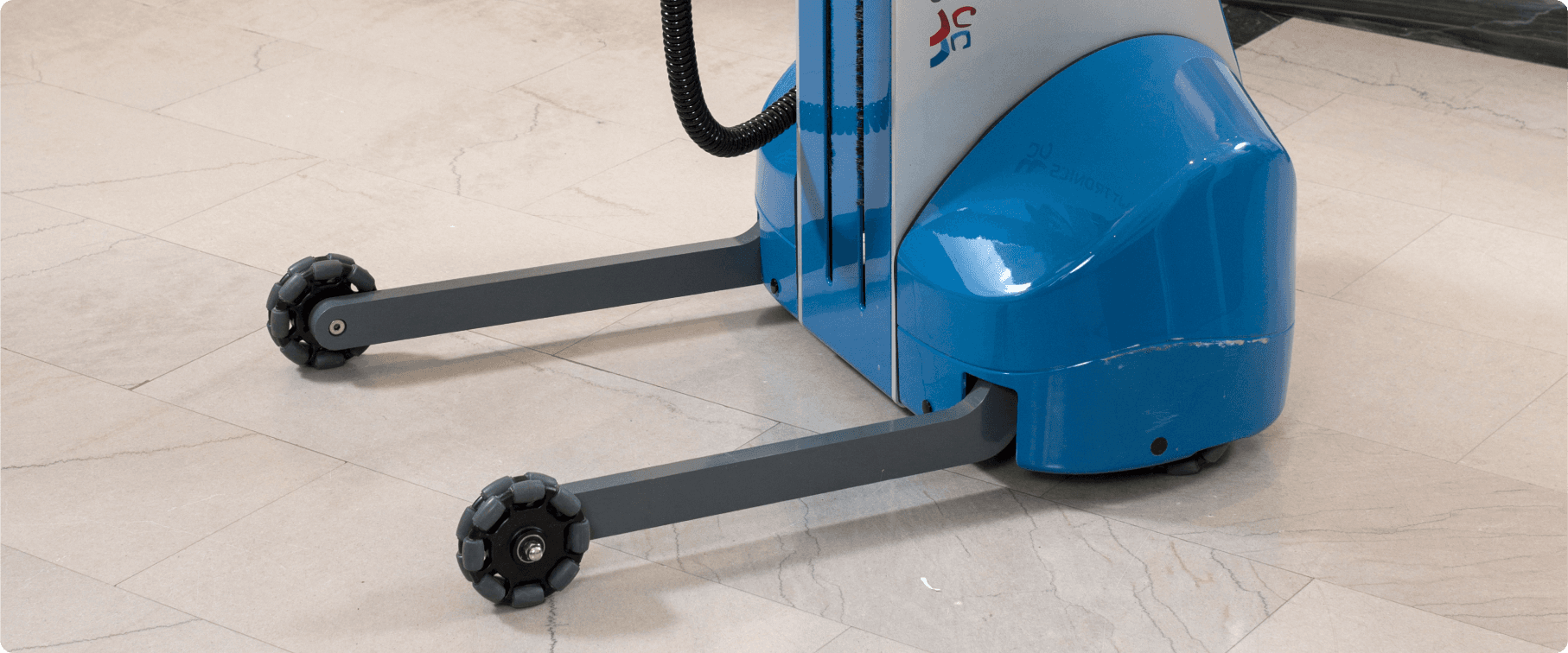 Close-up detail of the wheel on a robotically assisted walker, highlighting its durable design and smooth functionality for enhanced mobility and stability.