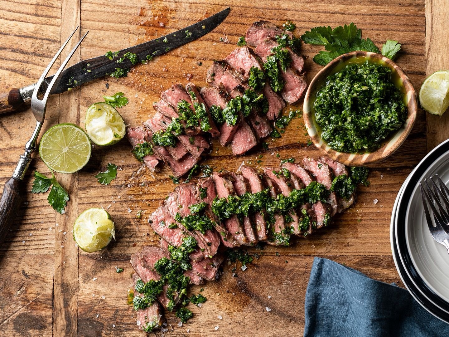 Sliced grilled steak with chimichurri sauce by Scorpion Chef Vancouver Island