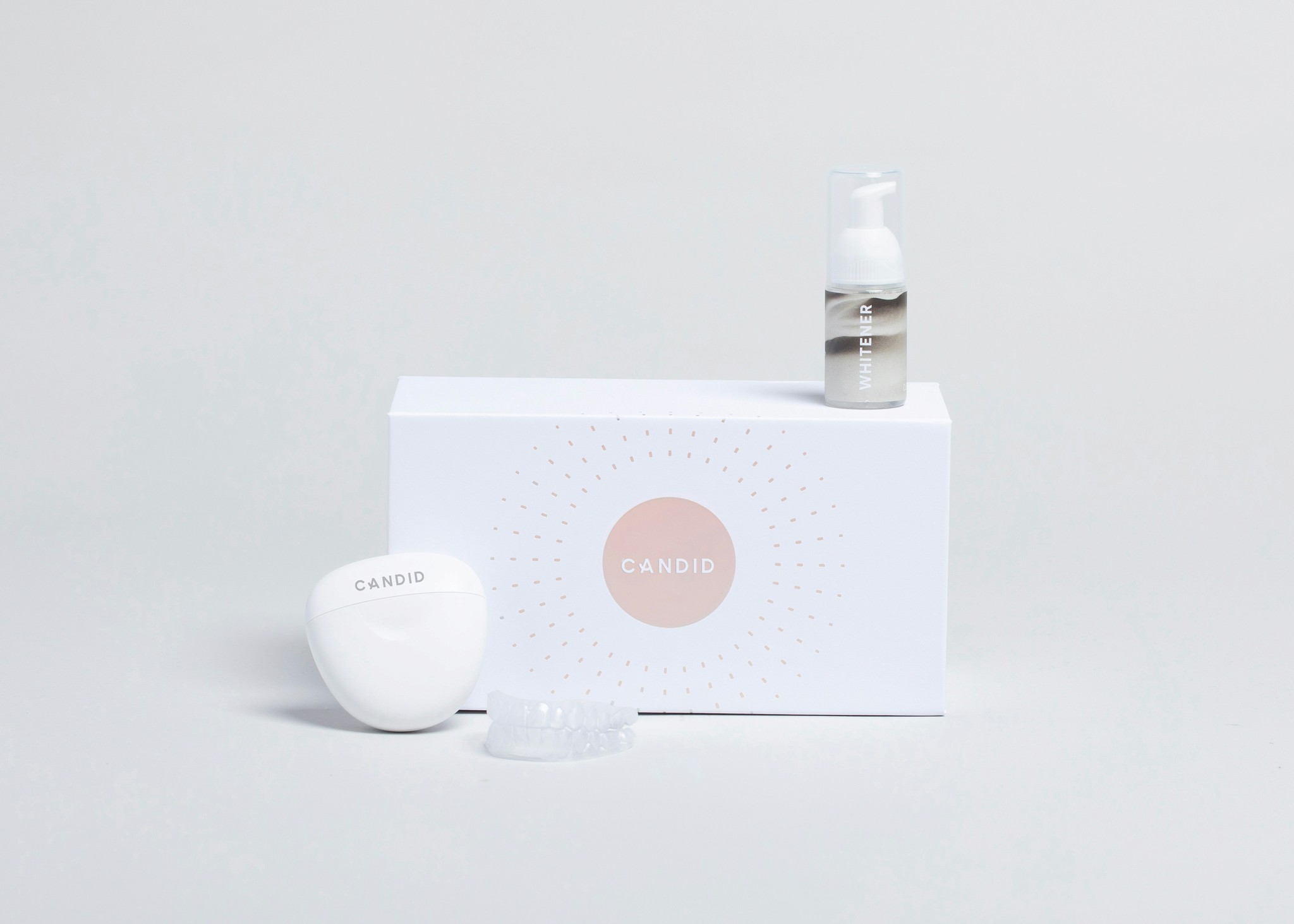 white plastic bottle on white box