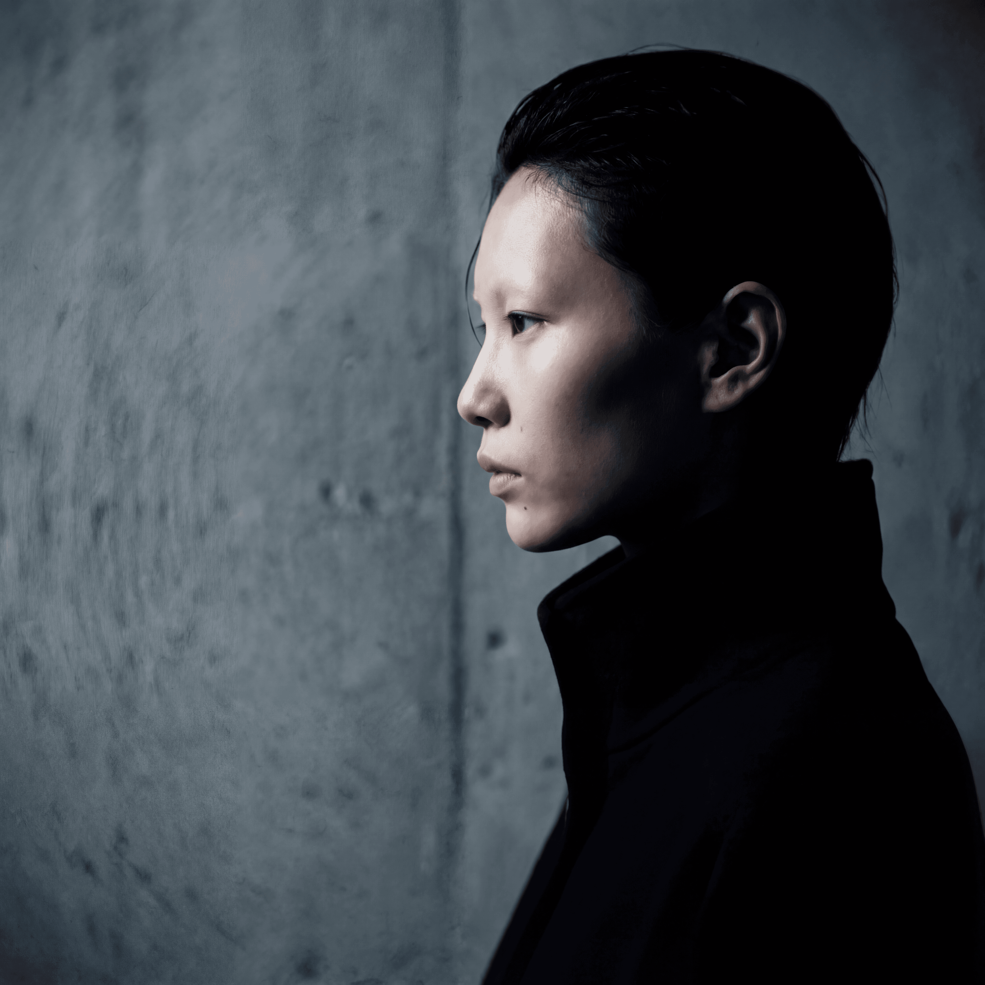 Human figure as structural element within monolithic architecture, Minimalist Luxury Composition, Panavision Millennium DXL2 optics, Cognitive Luxury, Engineered by Aventi