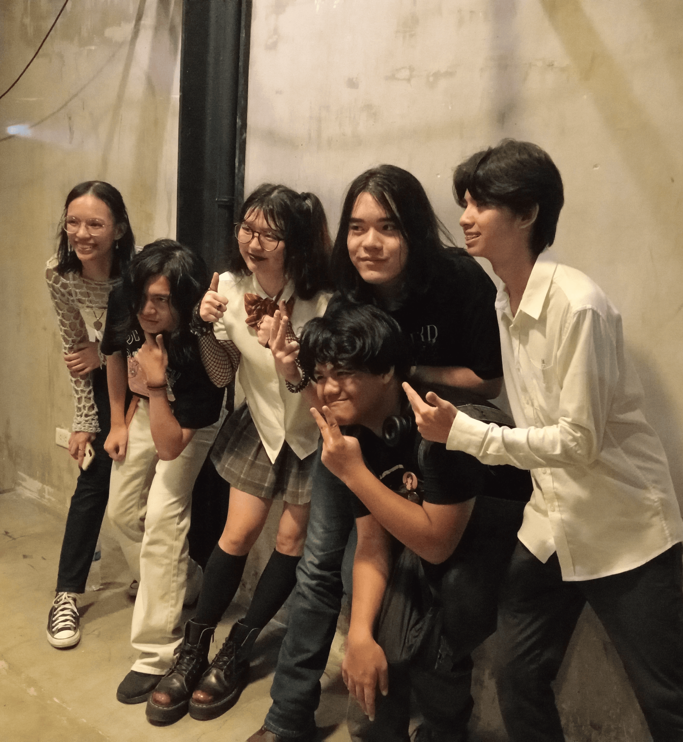 Members of "The Worst Answers" band posing for a photo.