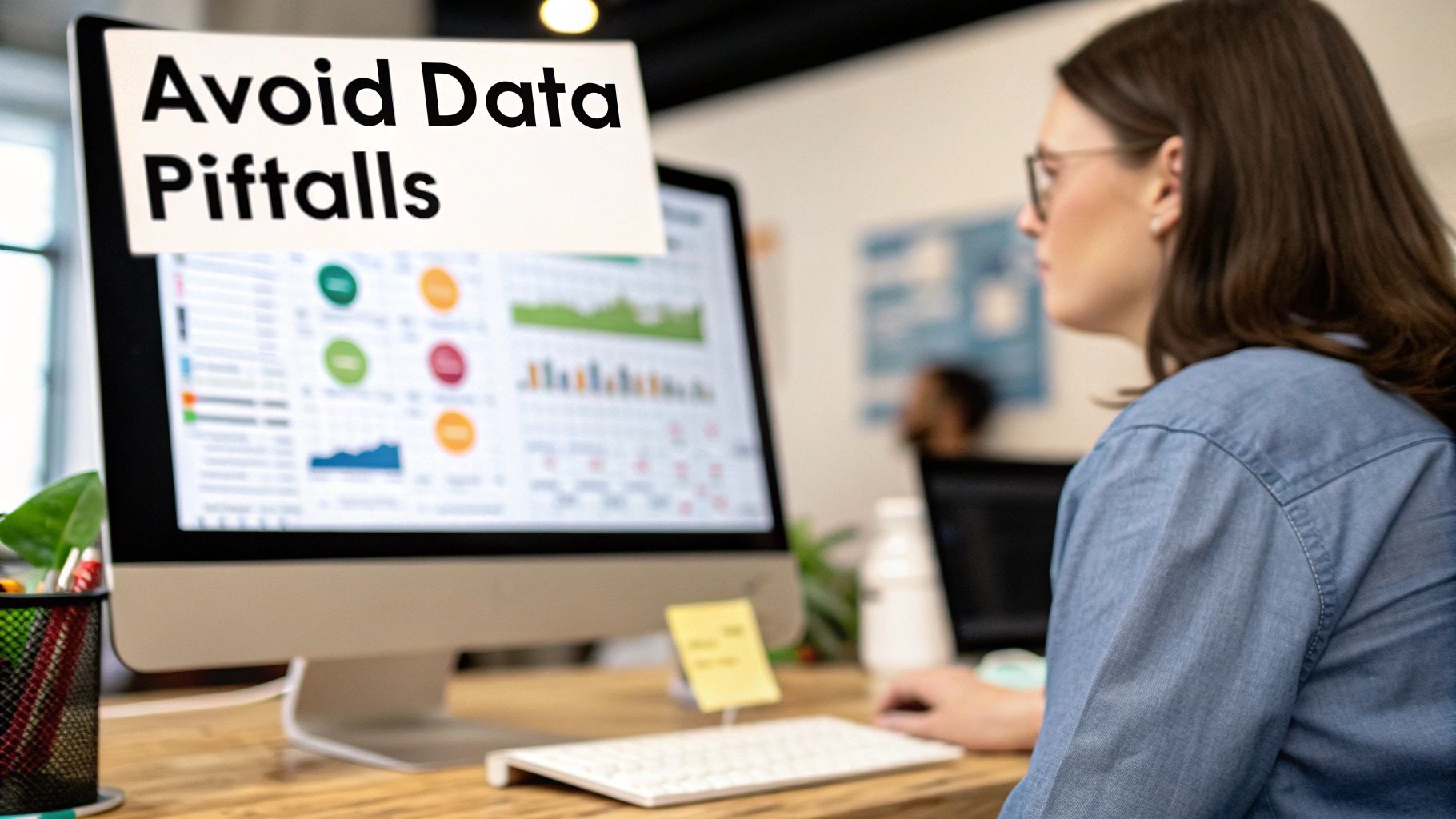 A person views a computer monitor displaying data charts, with a note saying 'Avoid Data Pitfalls'.