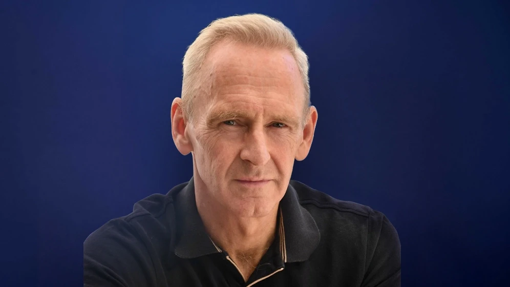 man wearing white V-neck shirt