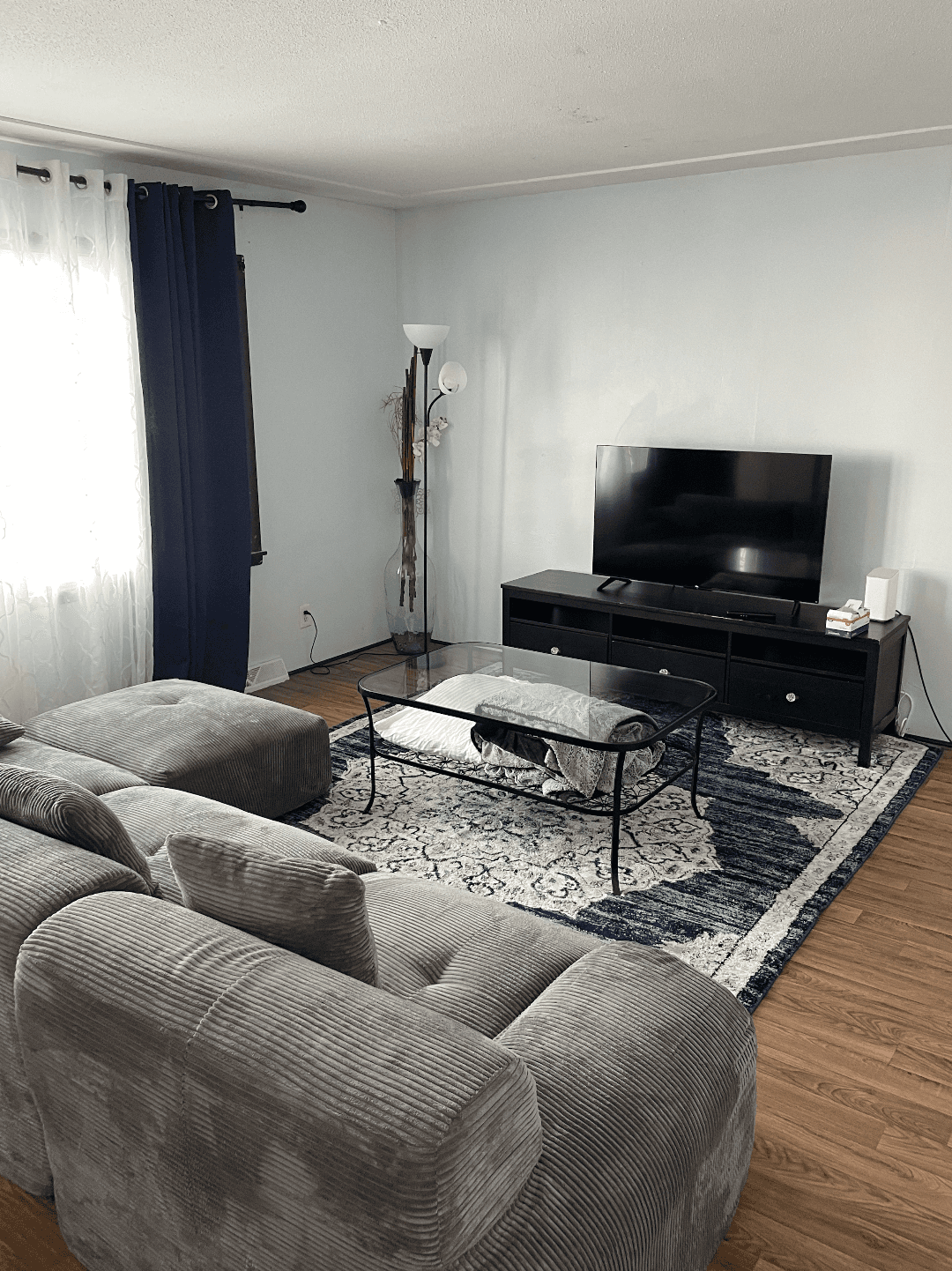 white wooden house between trees