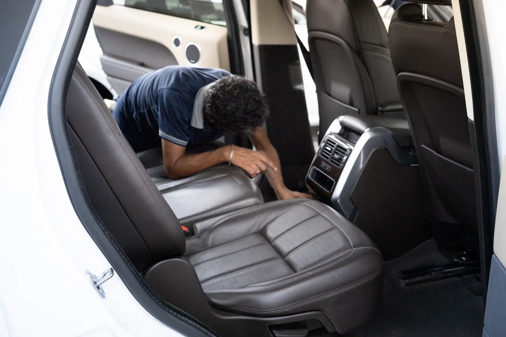 Person working on car A/C