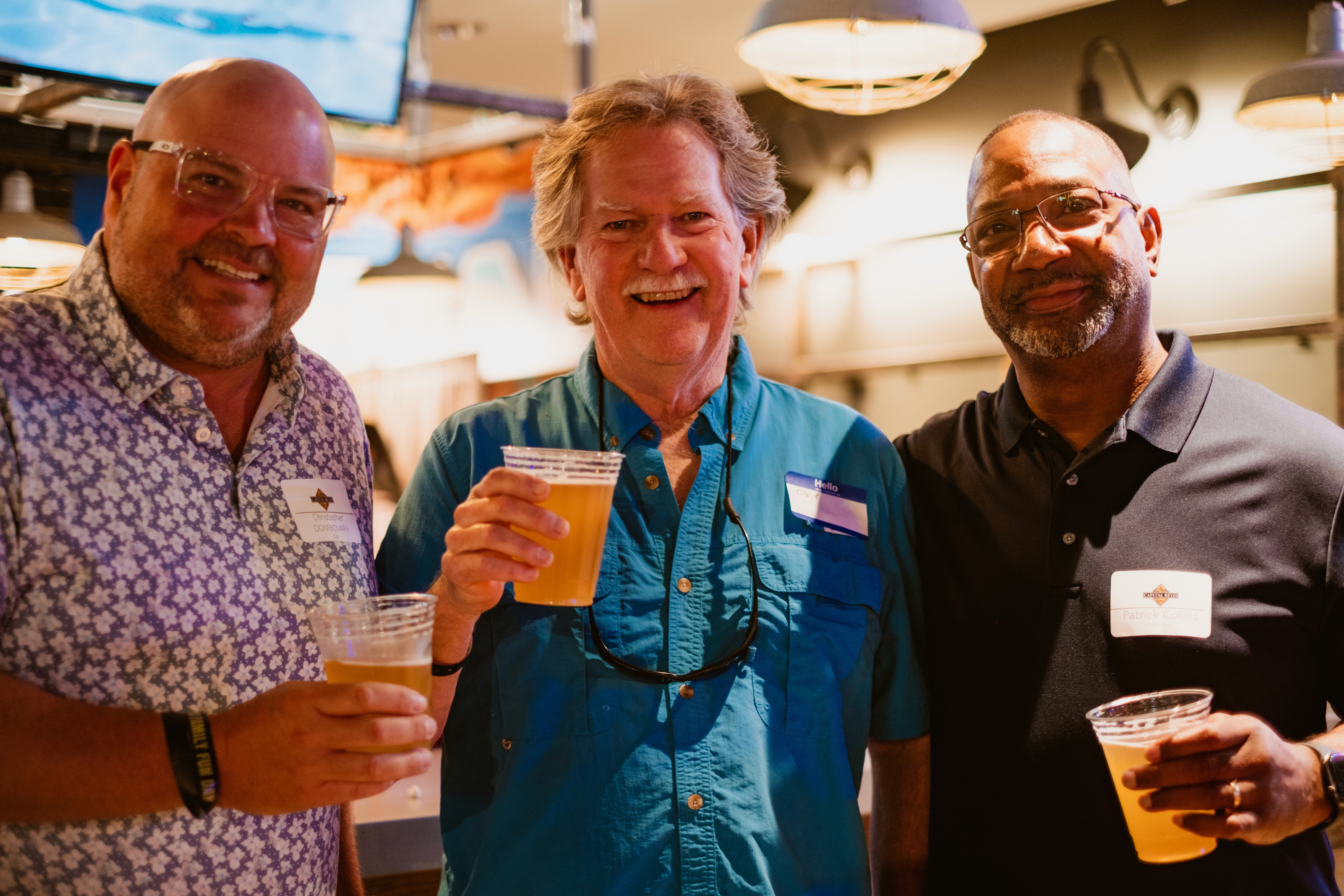 men drinking a drink