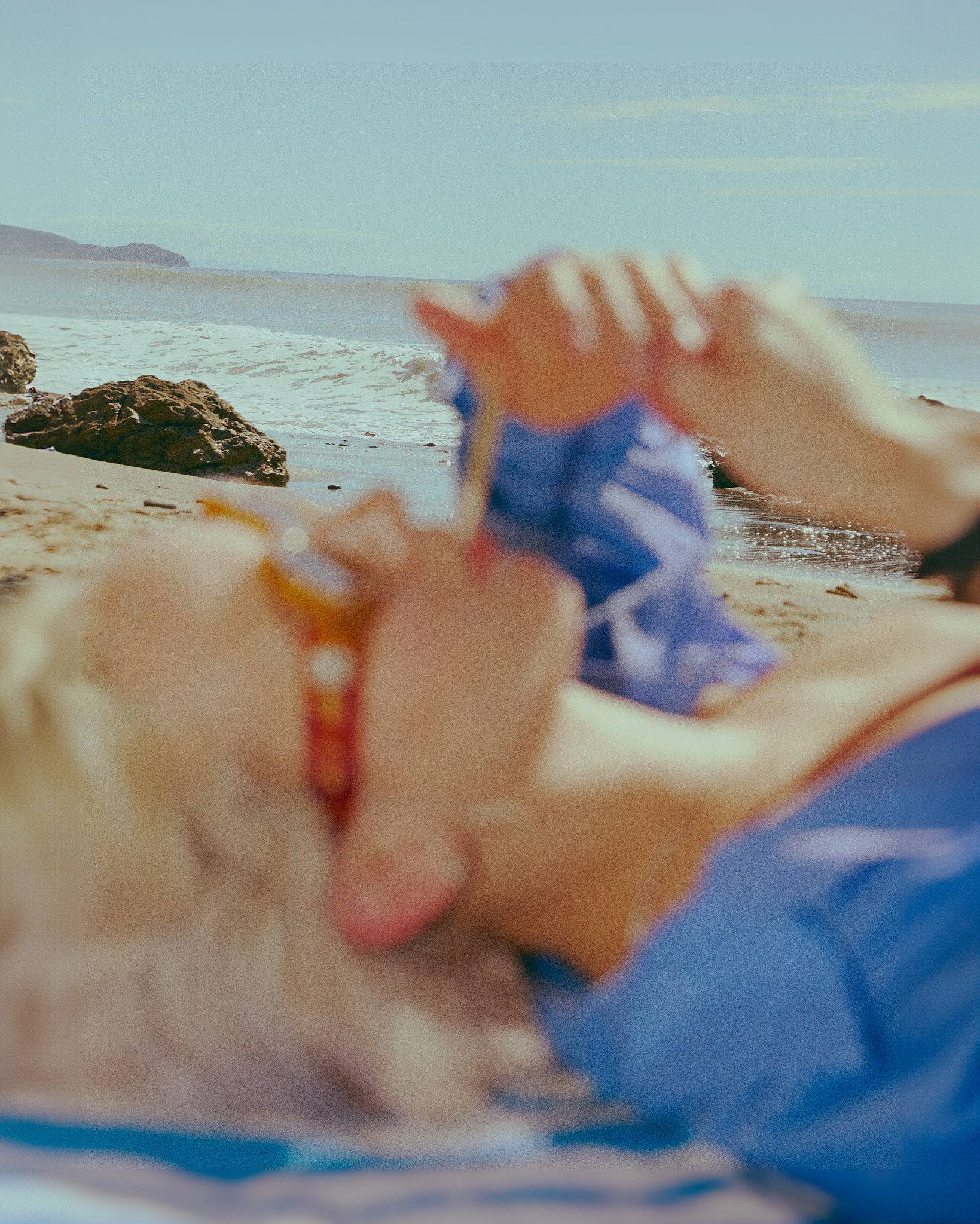 Woman walking on a curved pavement with shadow.
