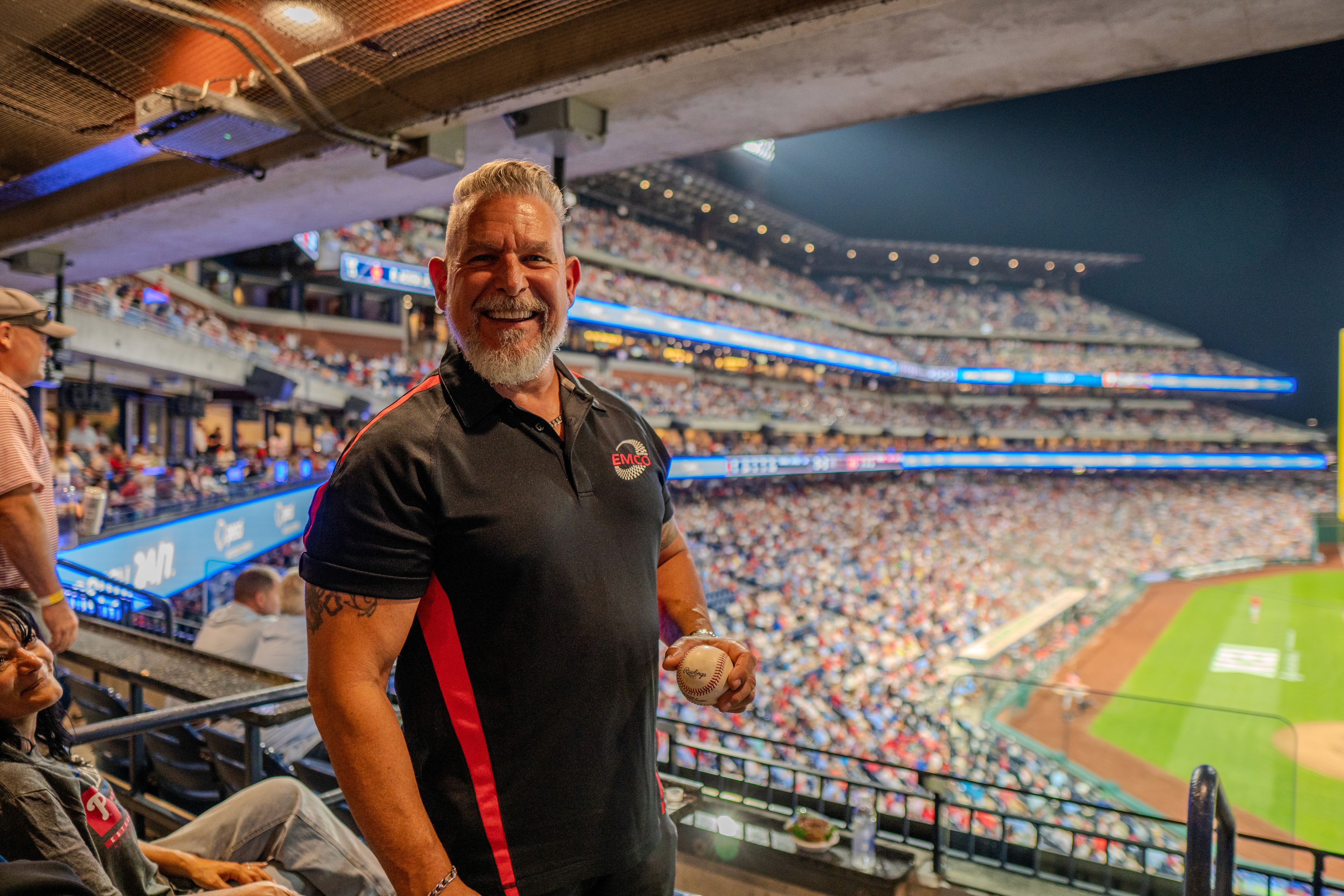 man holding baseball