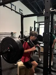 man in black hoodie standing