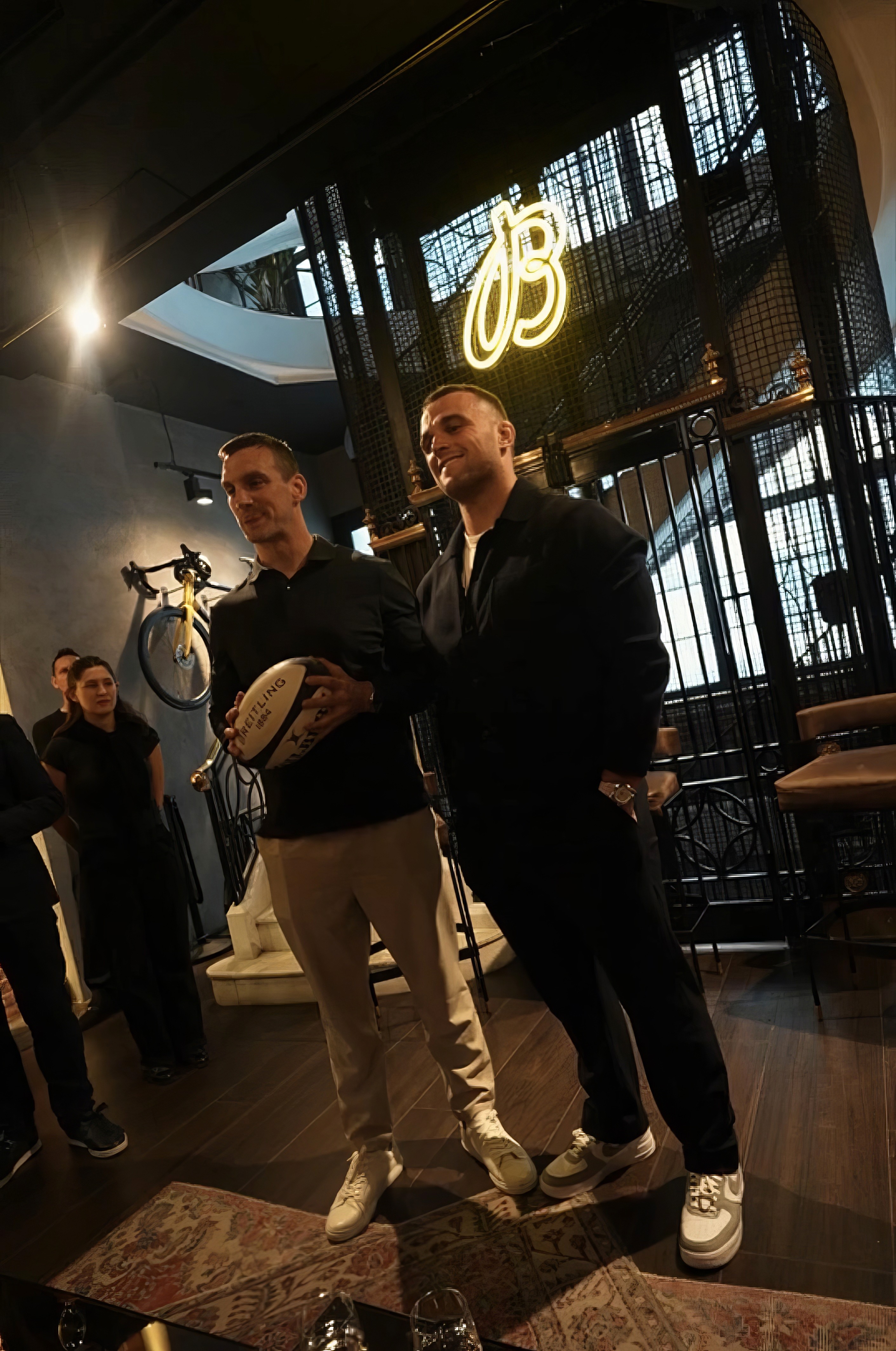 Close-up of bride and groom's torsos, bride in white dress