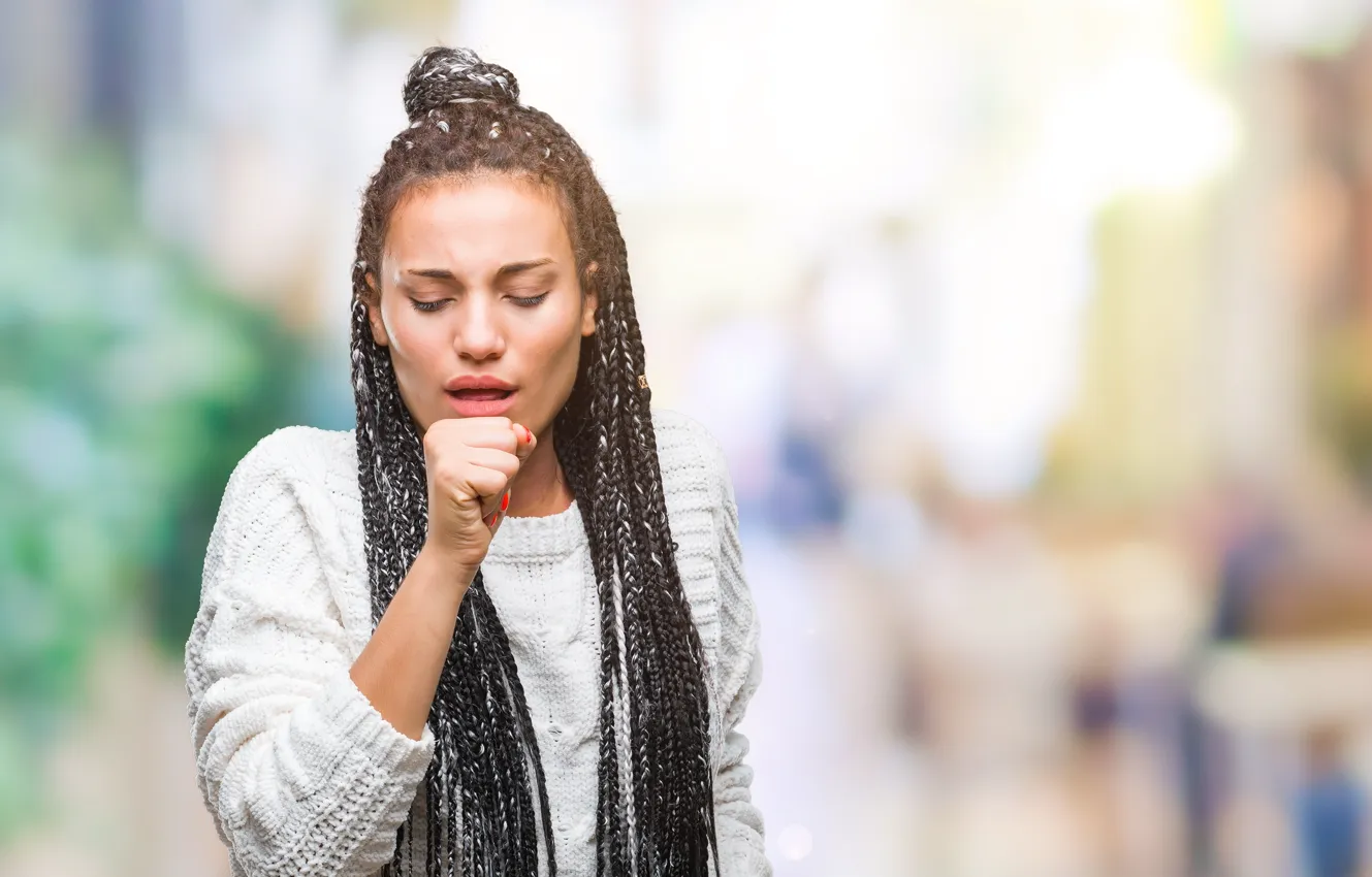 woman coughing 