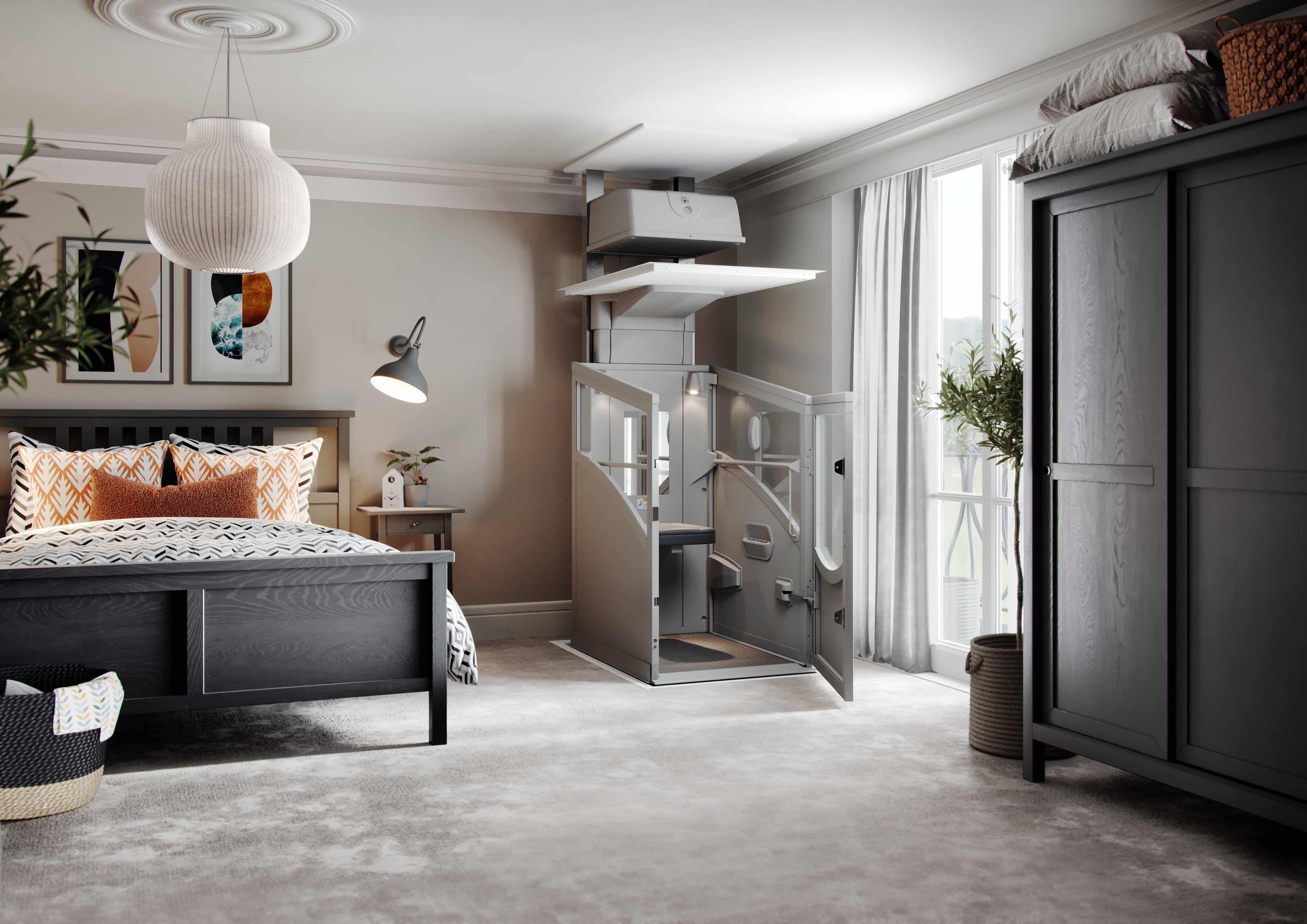 Small lift for houses — compact through-floor home lift in a bedroom corner beside the wardrobe