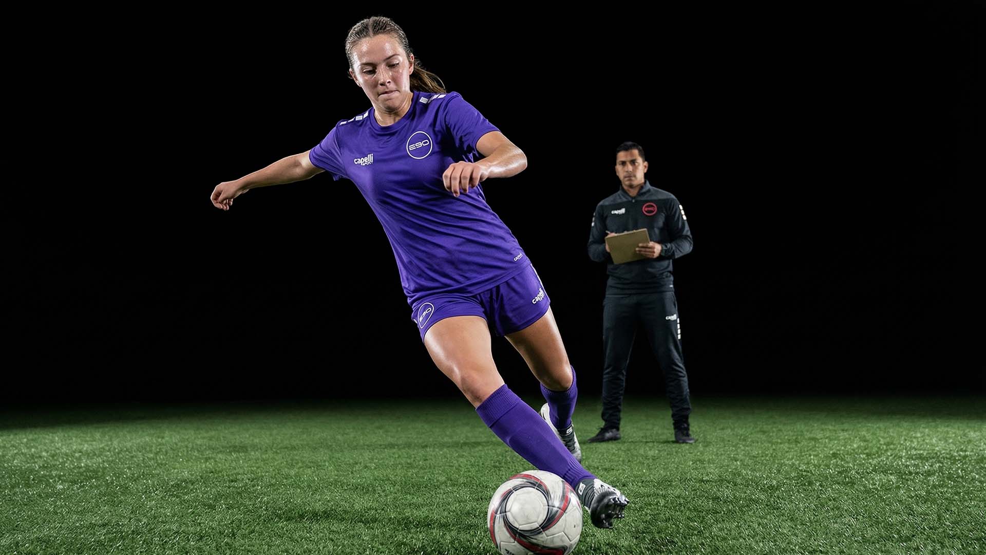 person playing soccer on field