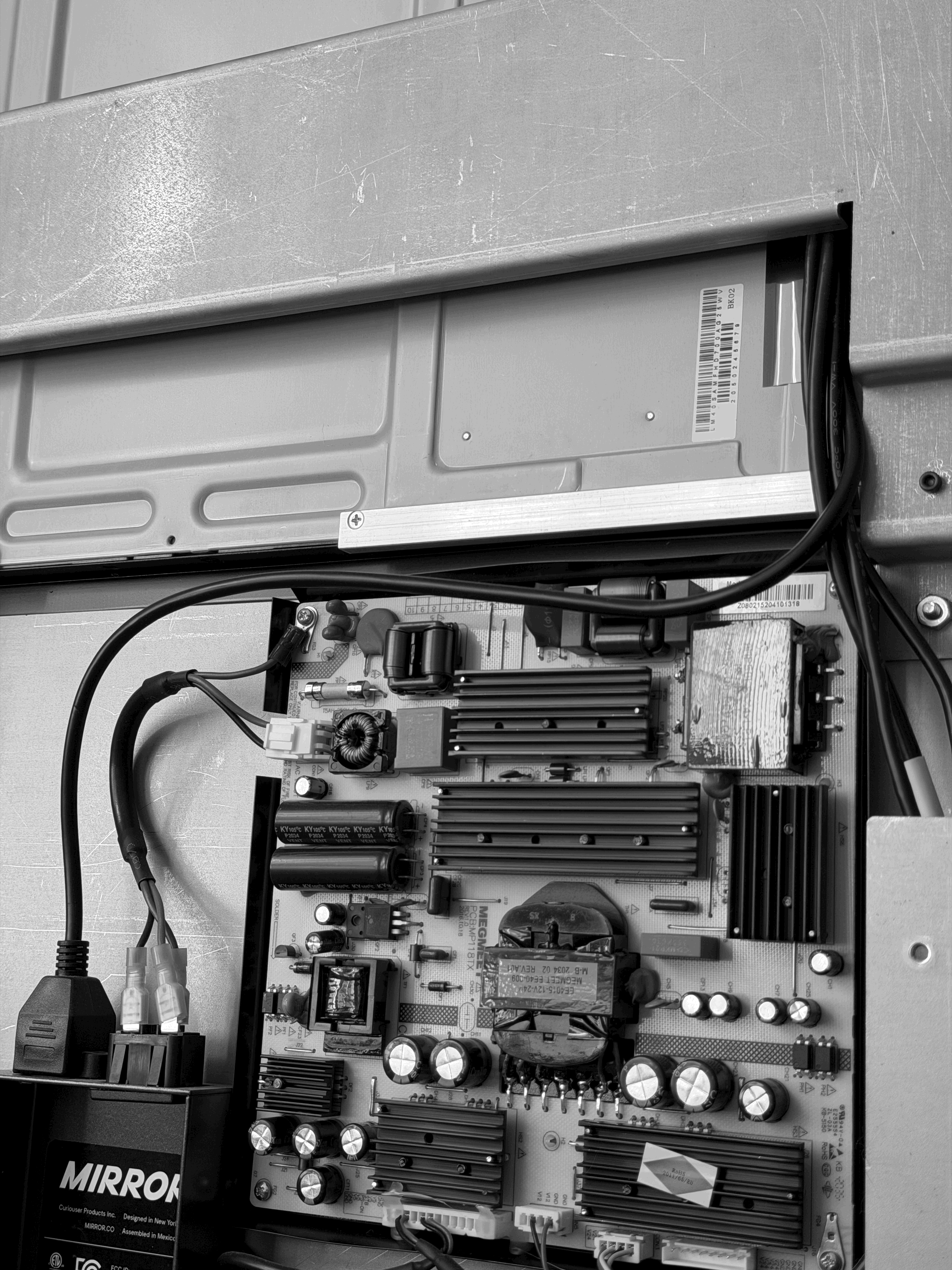 Batch.Works logo over a photo of a box of 3D printed objects