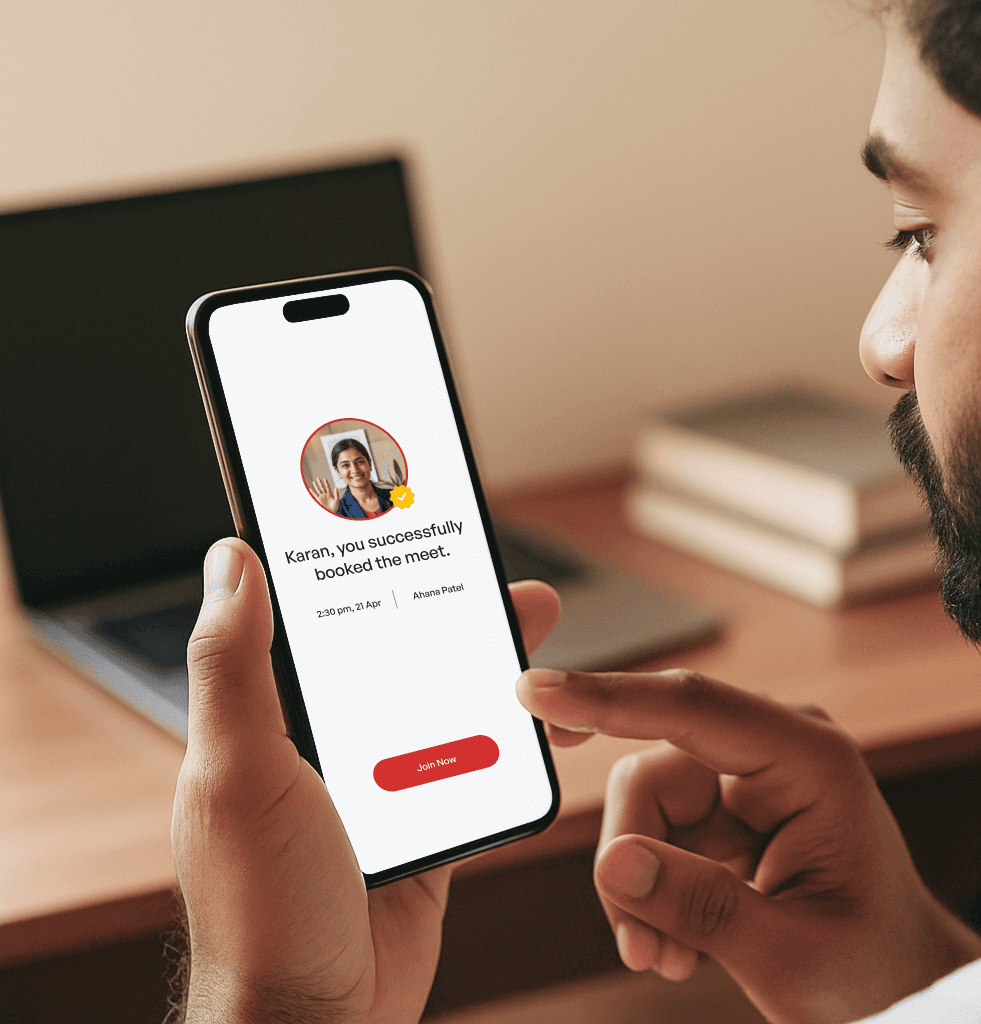 Customer using phone to book a Meet with a tax expert.