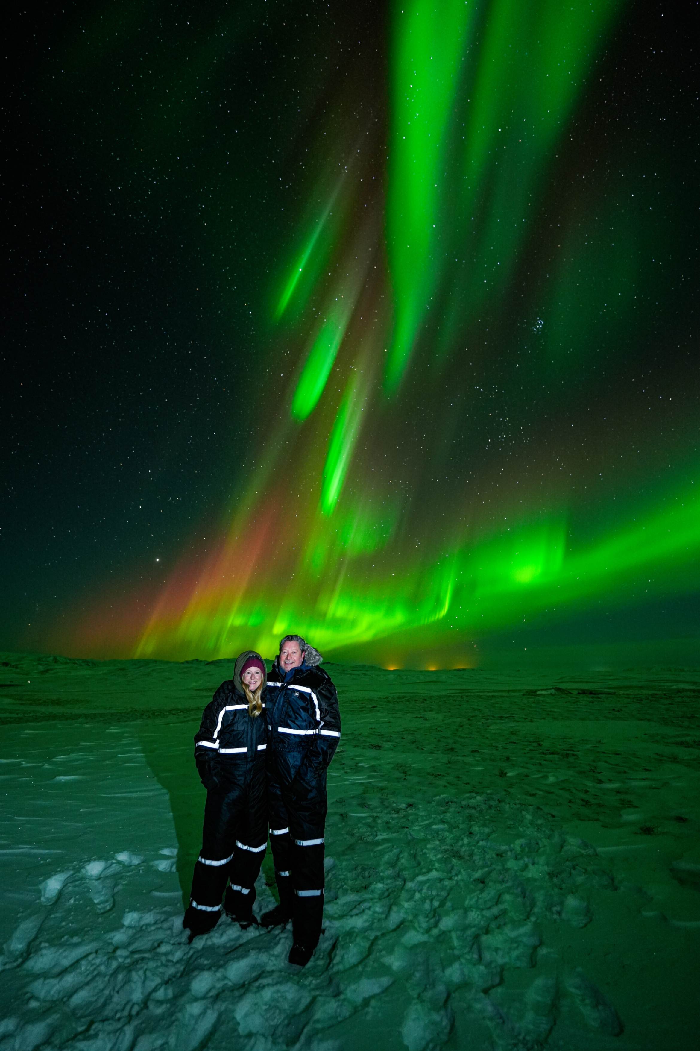 Northern Lights tour photography from Aurora Experts in Iceland, featuring guests beneath the aurora, winter landscapes, and vivid skies over remote Icelandic locations.
