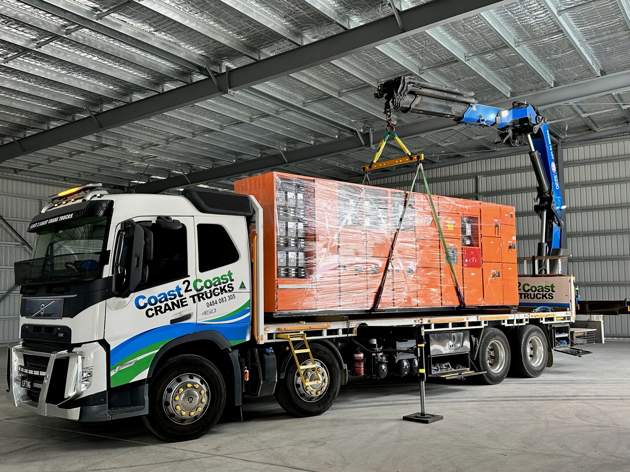 Crane truck with generator