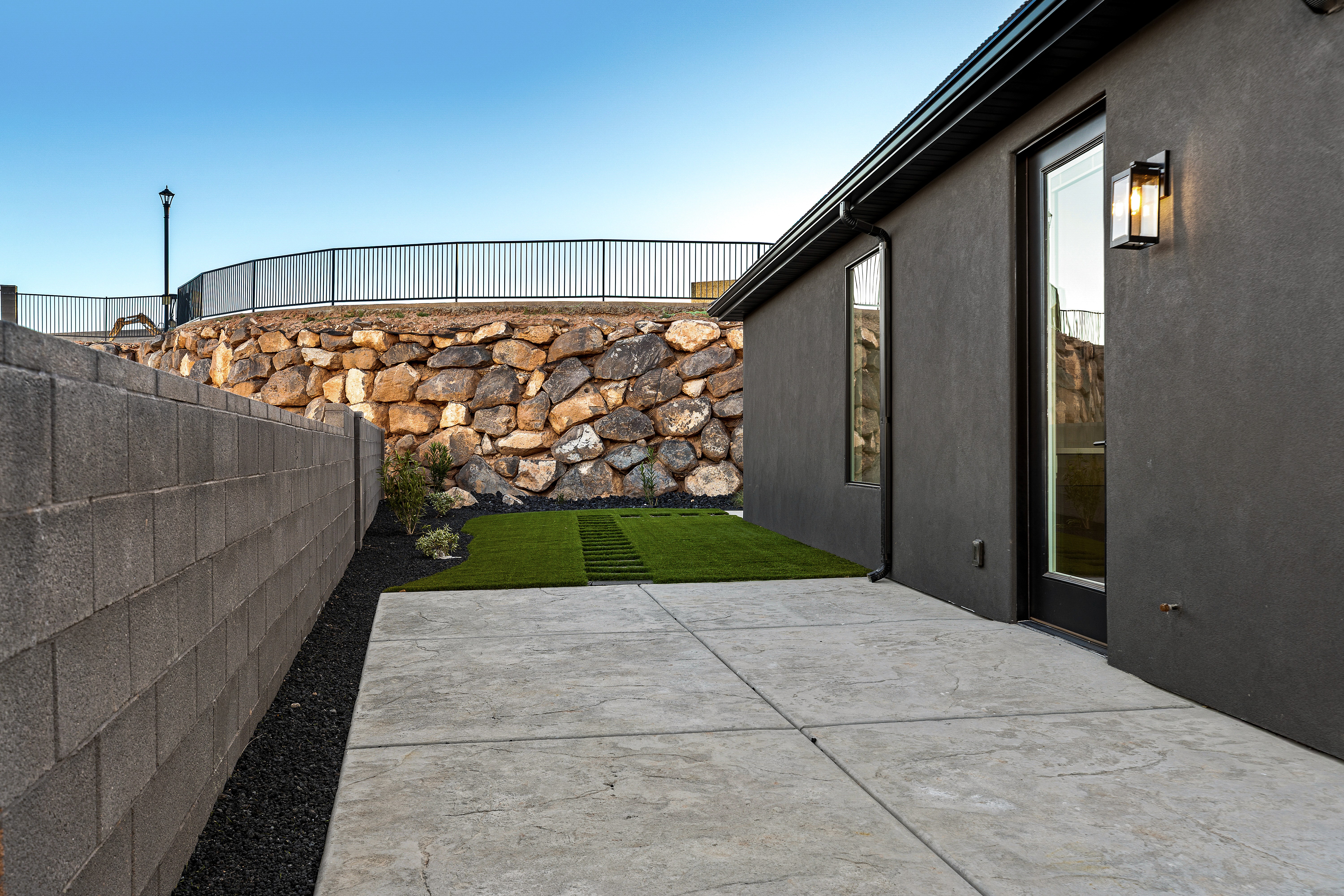 Backyard of a custom home in Hurricane Utah with open space and views of the surrounding landscape