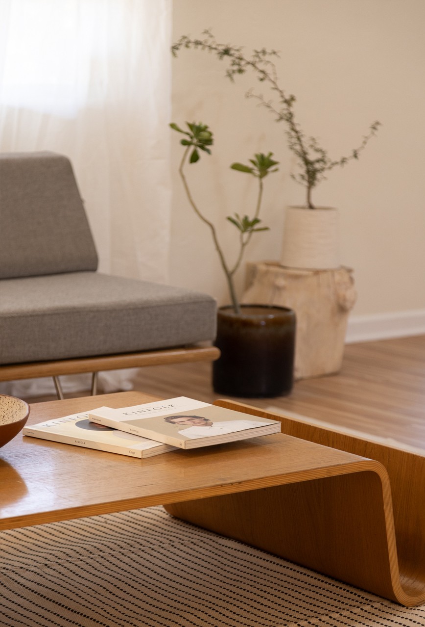 Staged living space with considered furnishings.