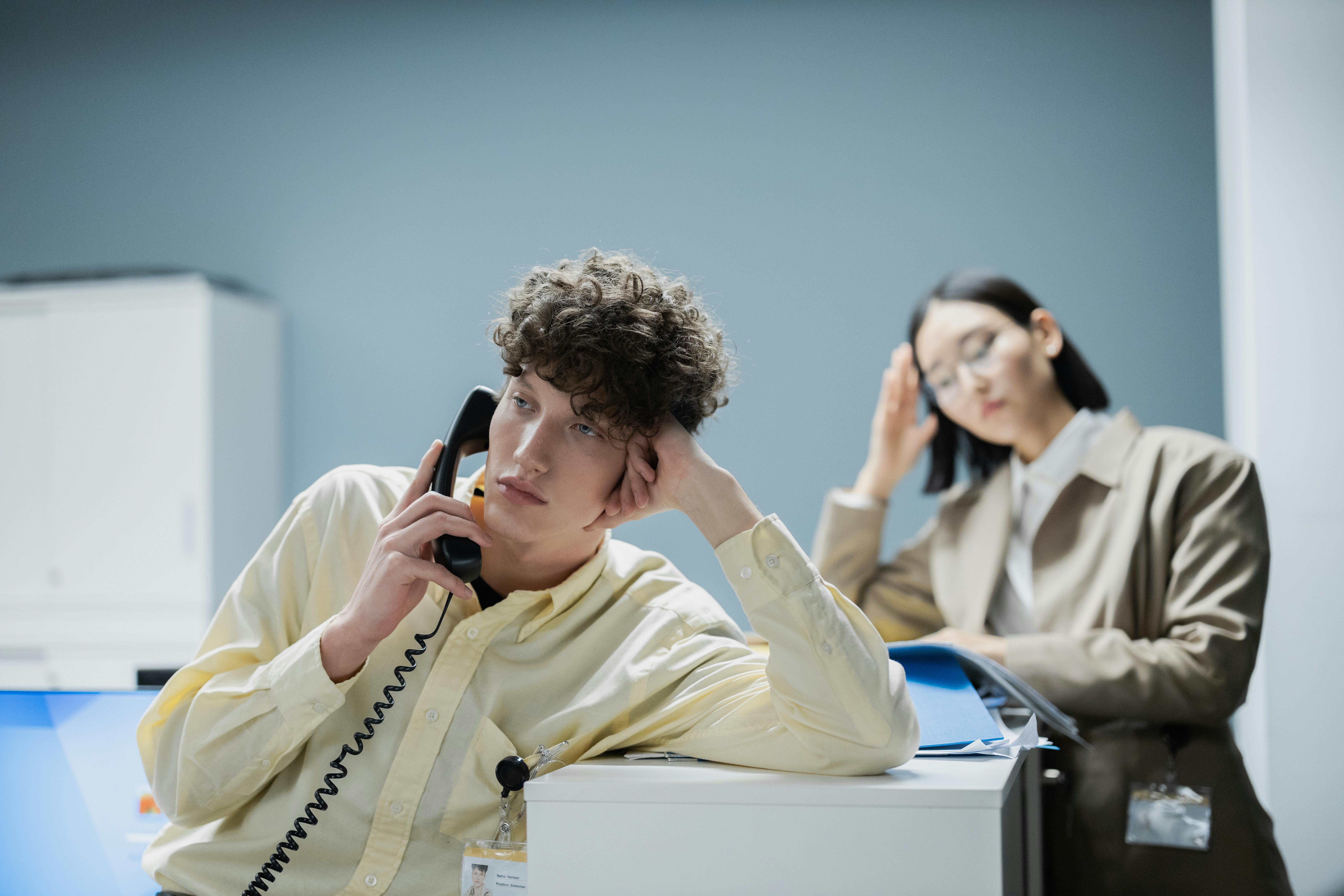 Man and woman talking on the phone