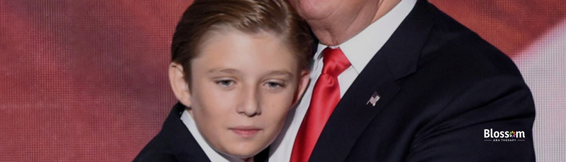 Donald Trump hugging Barron Trump.